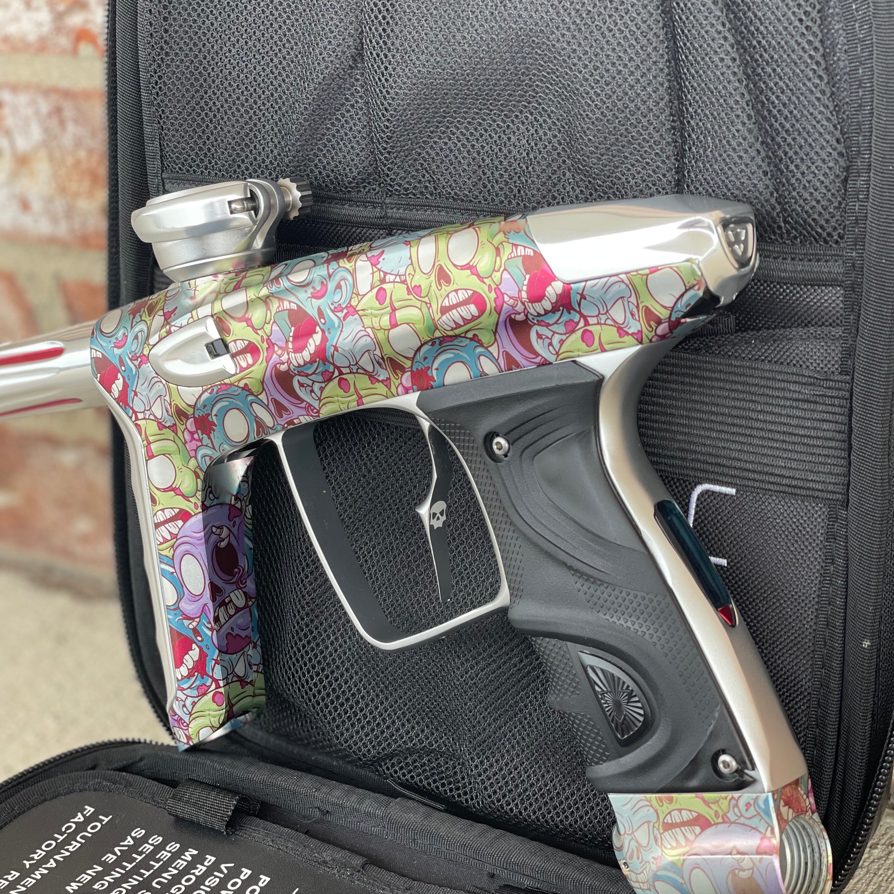 Used DLX Luxe TM40 Paintball Gun - LE Zombie Edition w/Silver Deuce Trigger & Wireless Charger