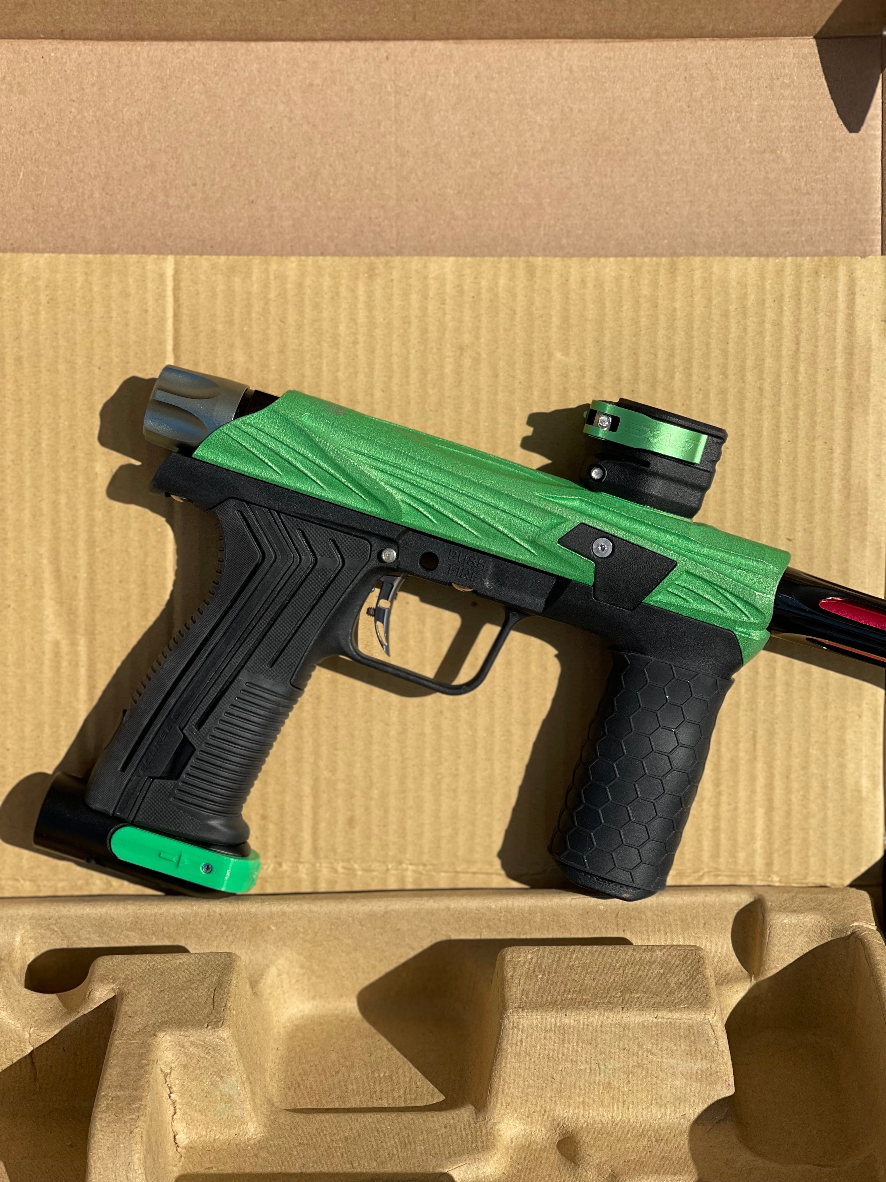 Used Planet Eclipse Emek 100 Paintball Gun - Green - Custom Body w/ Infamous Murder Trigger w/ Freak XL Barrel Kit, Hair 45 Trigger Valve, POPS ASA, Exalt Back Cap, Exalt Feedneck Lever, Rubber Front Grip Sleeve