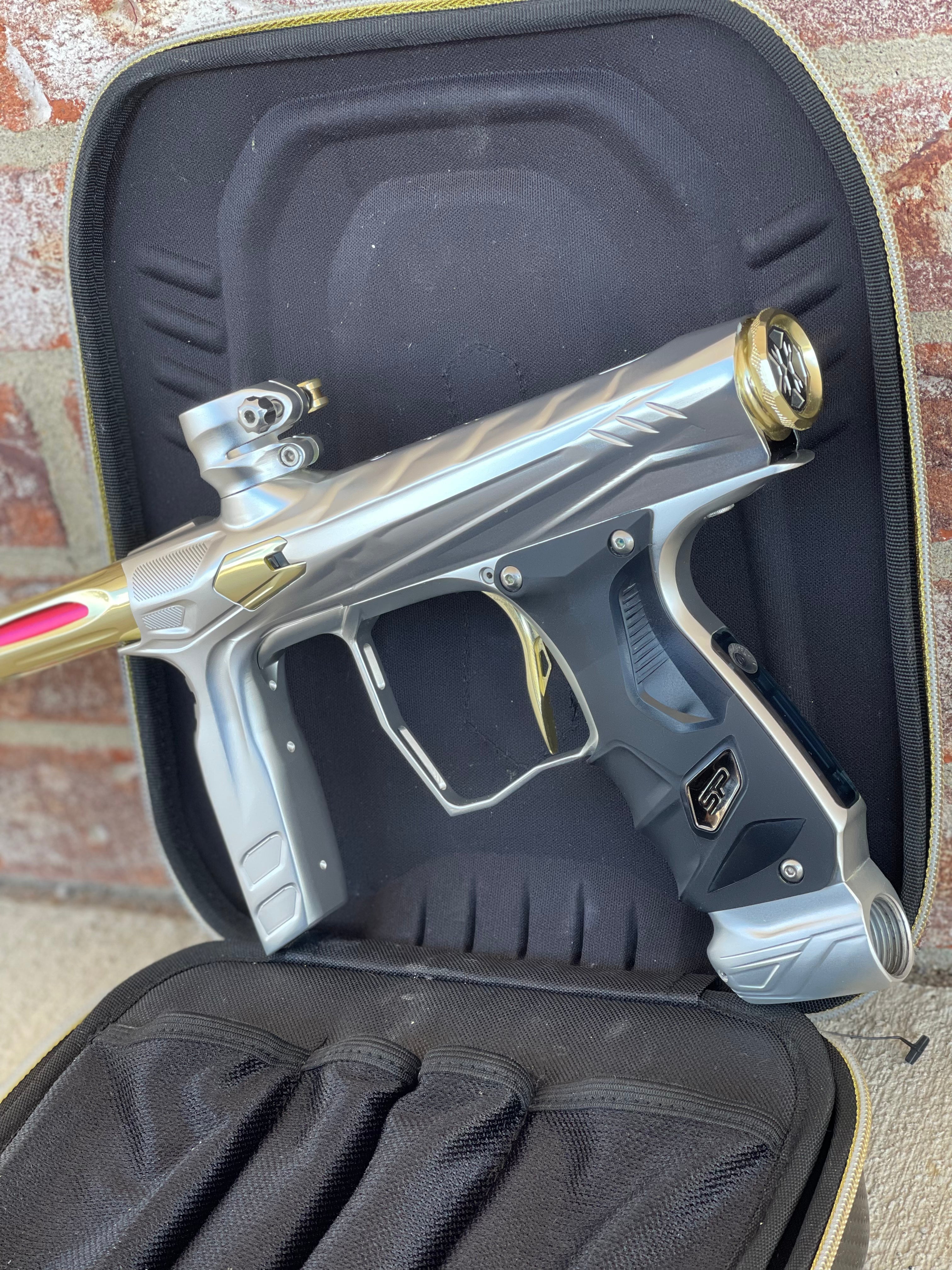 Used HK Army Shocker Amp Paintball Gun - Silver/ Gold