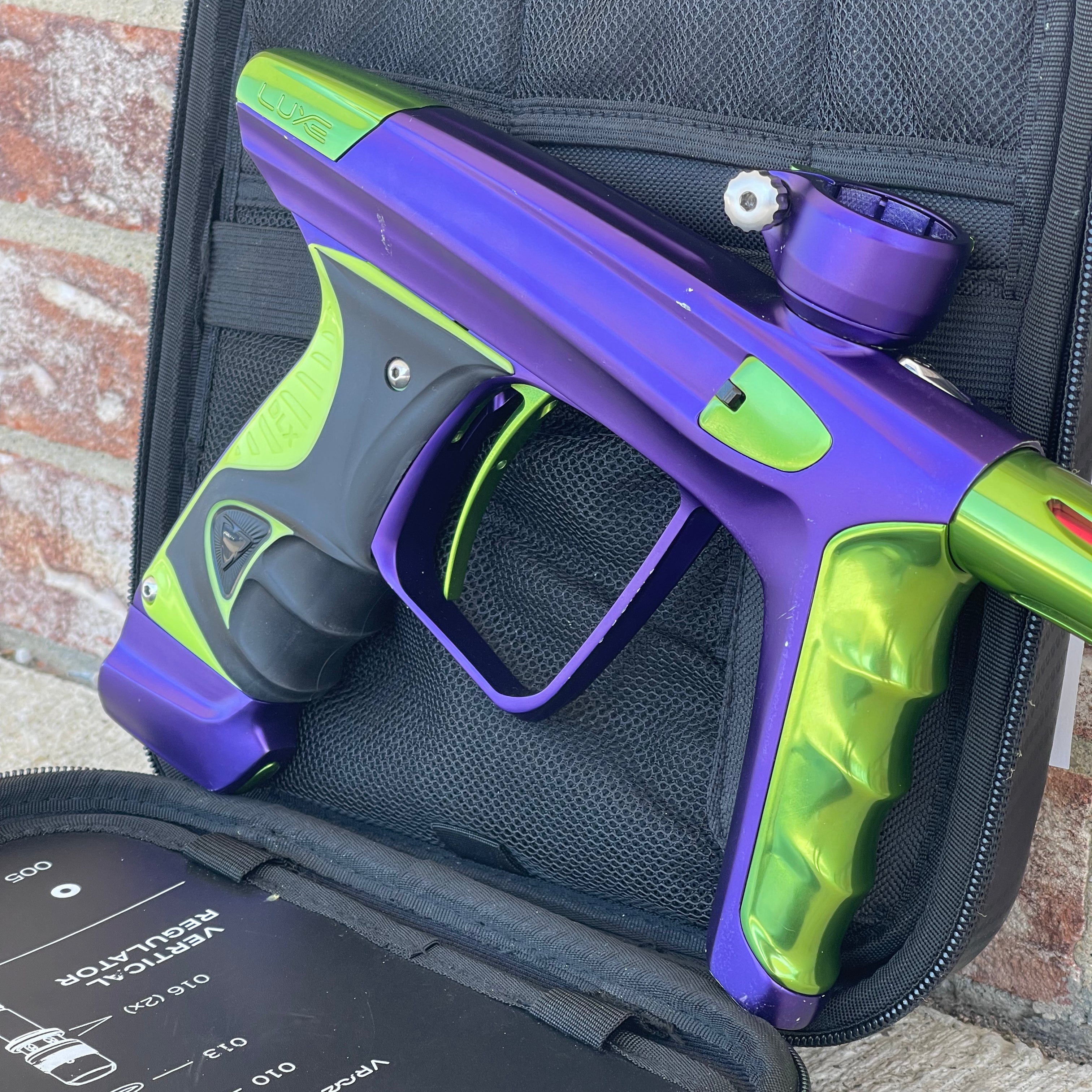 Used DLX Luxe X Paintball Gun - Dust Purple / Polished Green