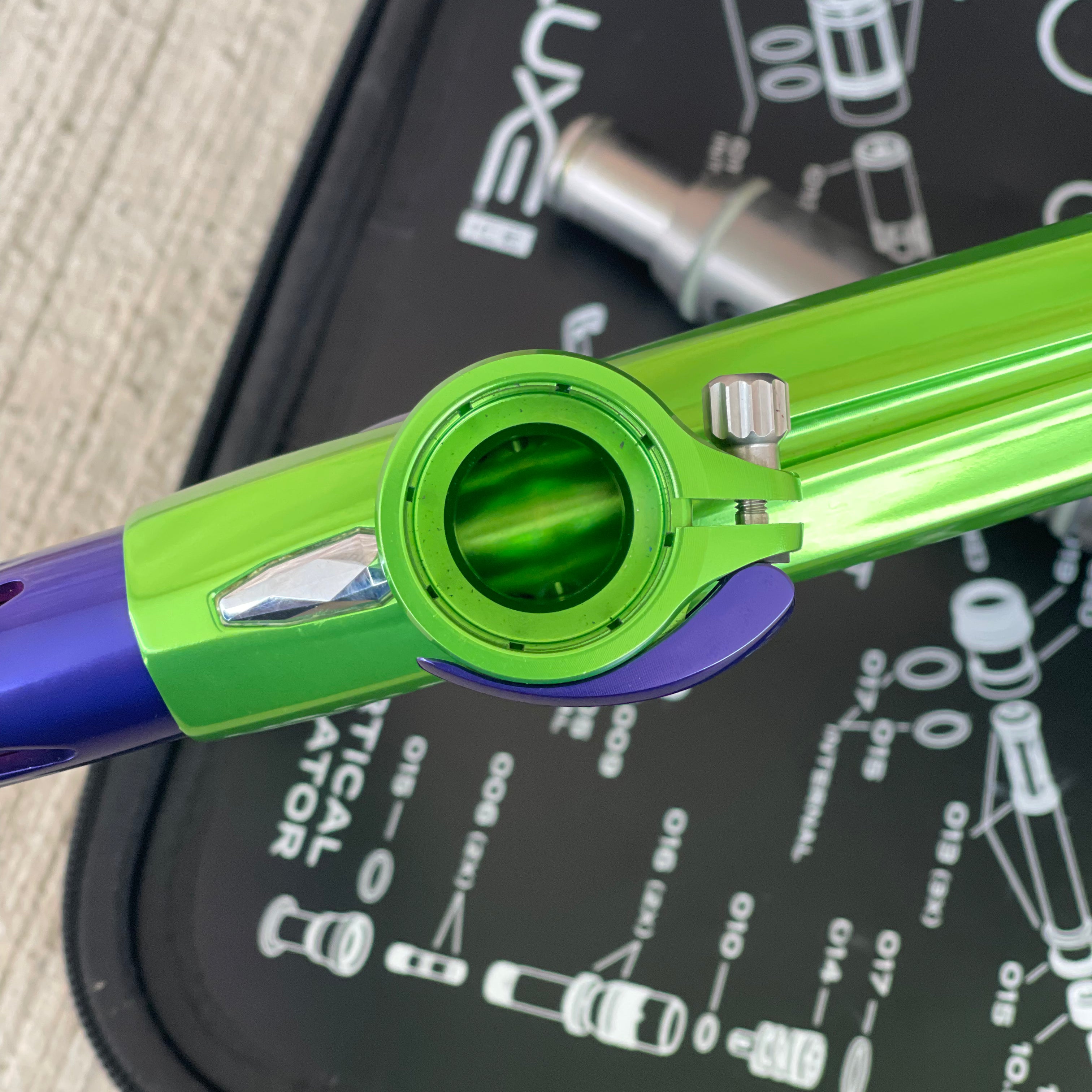 Used DLX Luxe ICE Paintball Gun - Polished Green / Polished Purple