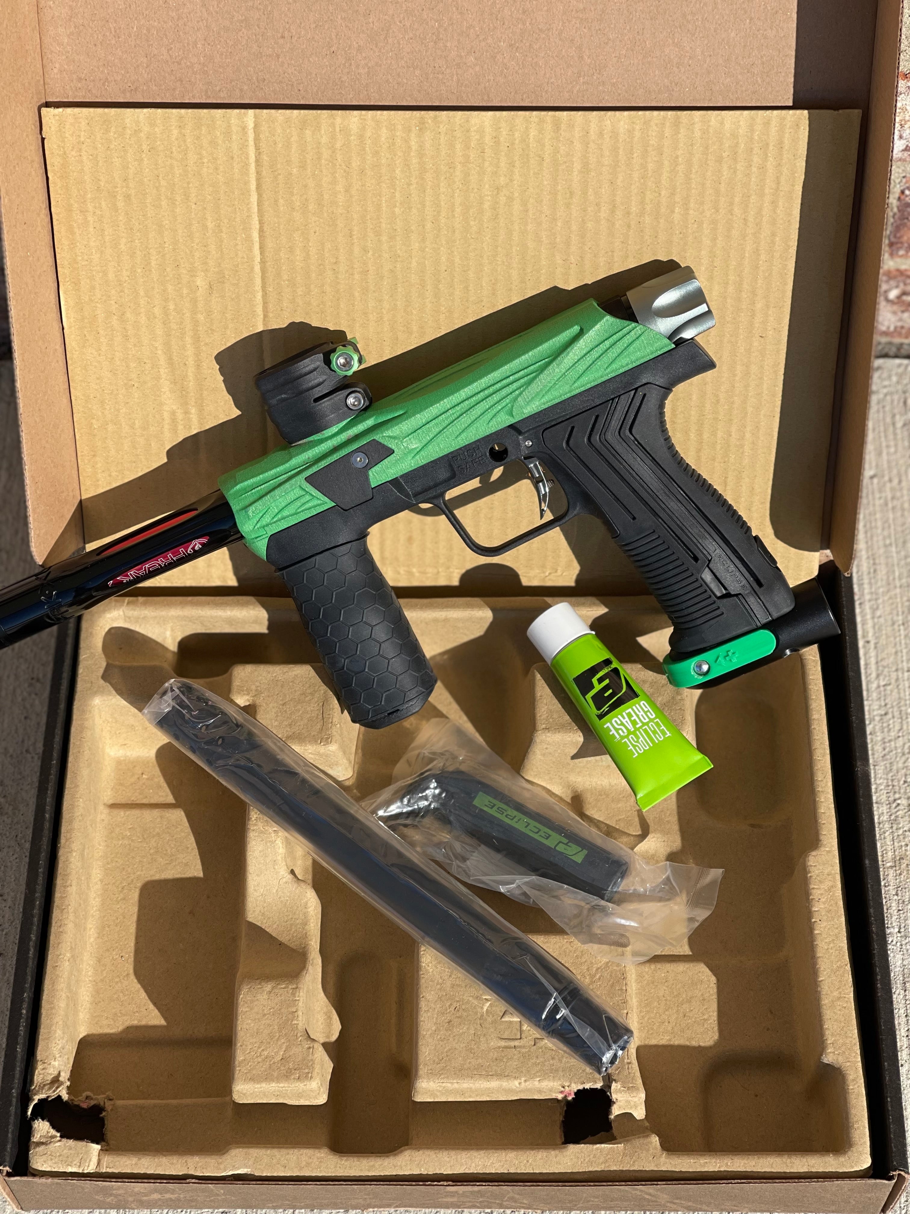 Used Planet Eclipse Emek 100 Paintball Gun - Green - Custom Body w/ Infamous Murder Trigger w/ Freak XL Barrel Kit, Hair 45 Trigger Valve, POPS ASA, Exalt Back Cap, Exalt Feedneck Lever, Rubber Front Grip Sleeve