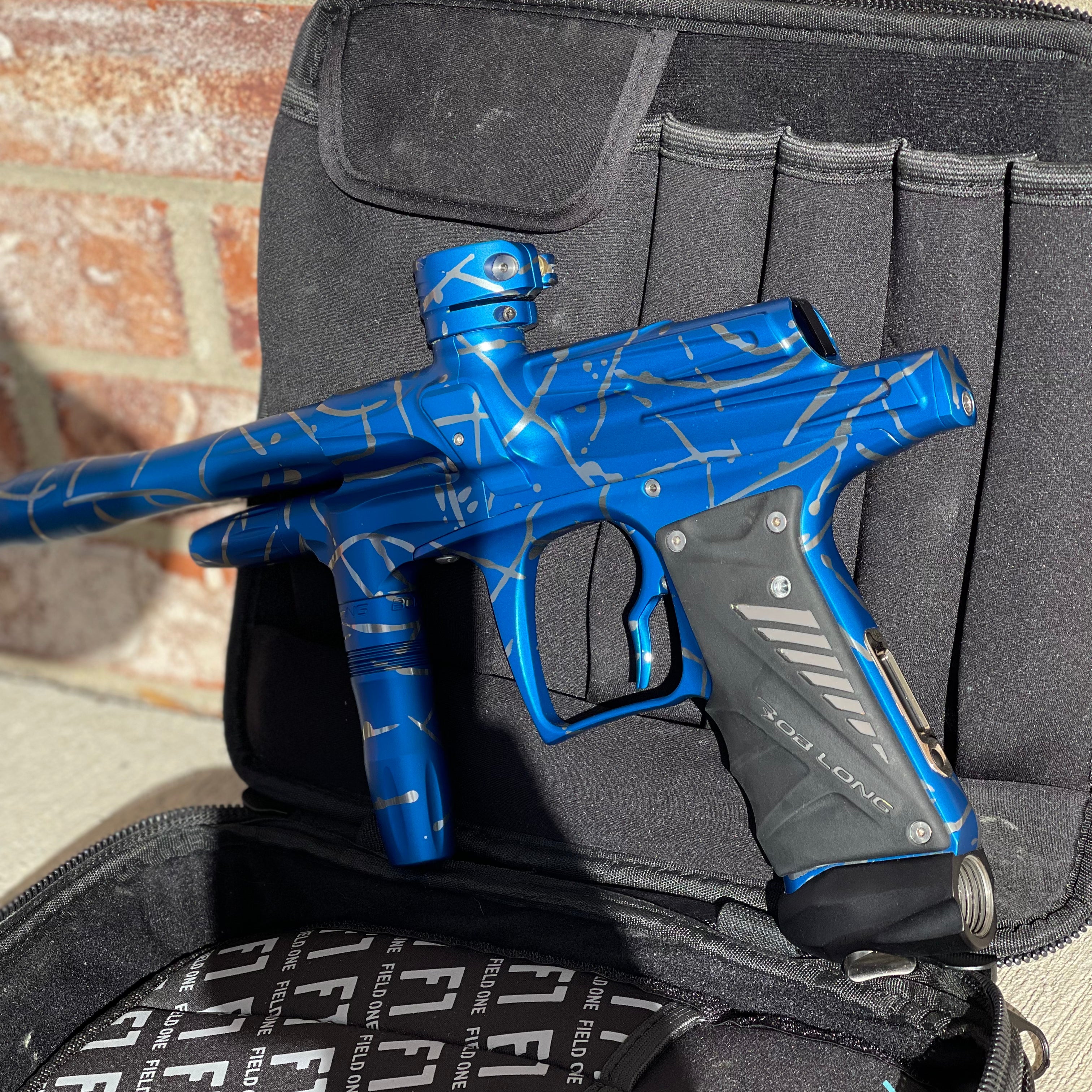 Used Bob Long G6R OLED Paintball Gun - Z Cut - Blue/Silver Splash