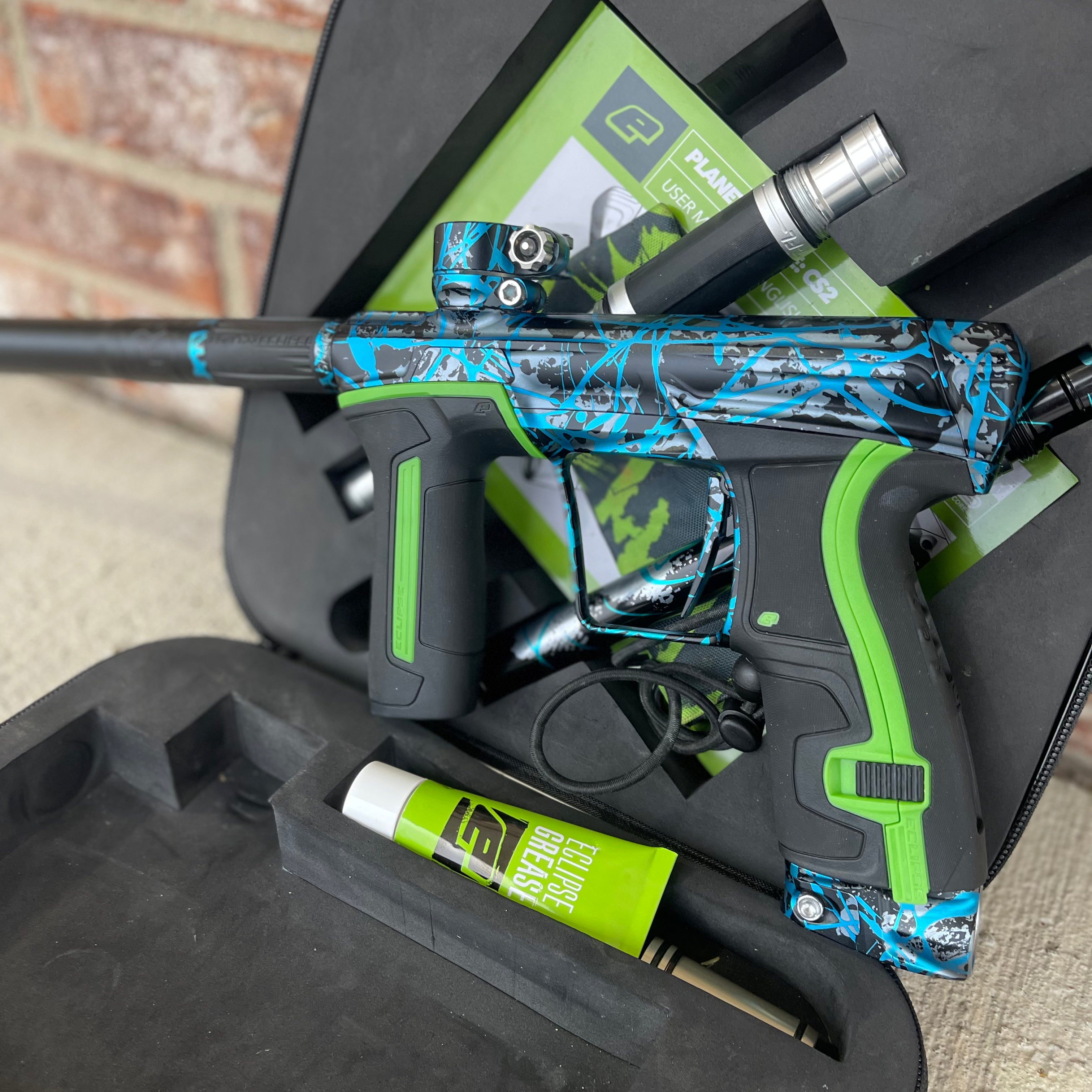 Used Planet Eclipse CS2 Paintball Gun - Aftershock Splash w/ Green Grip Kit