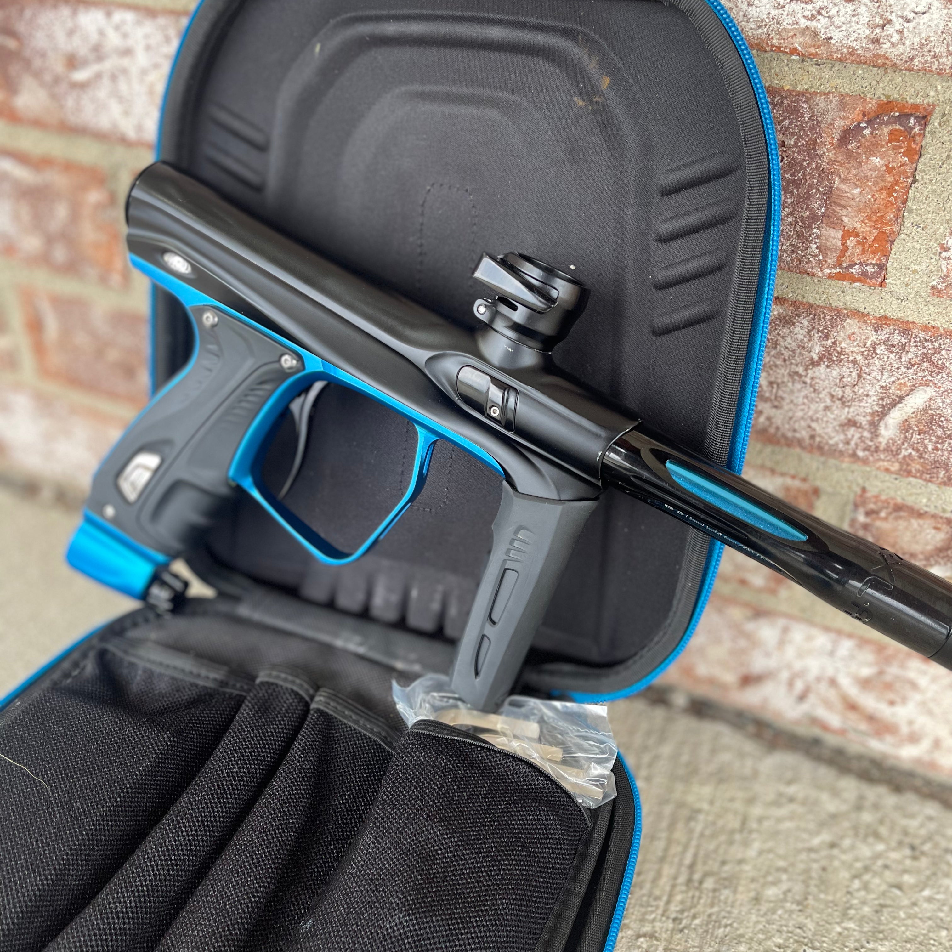 Used Shocker XLS Paintball Gun - Dust Black w/ Blue Trigger Frame