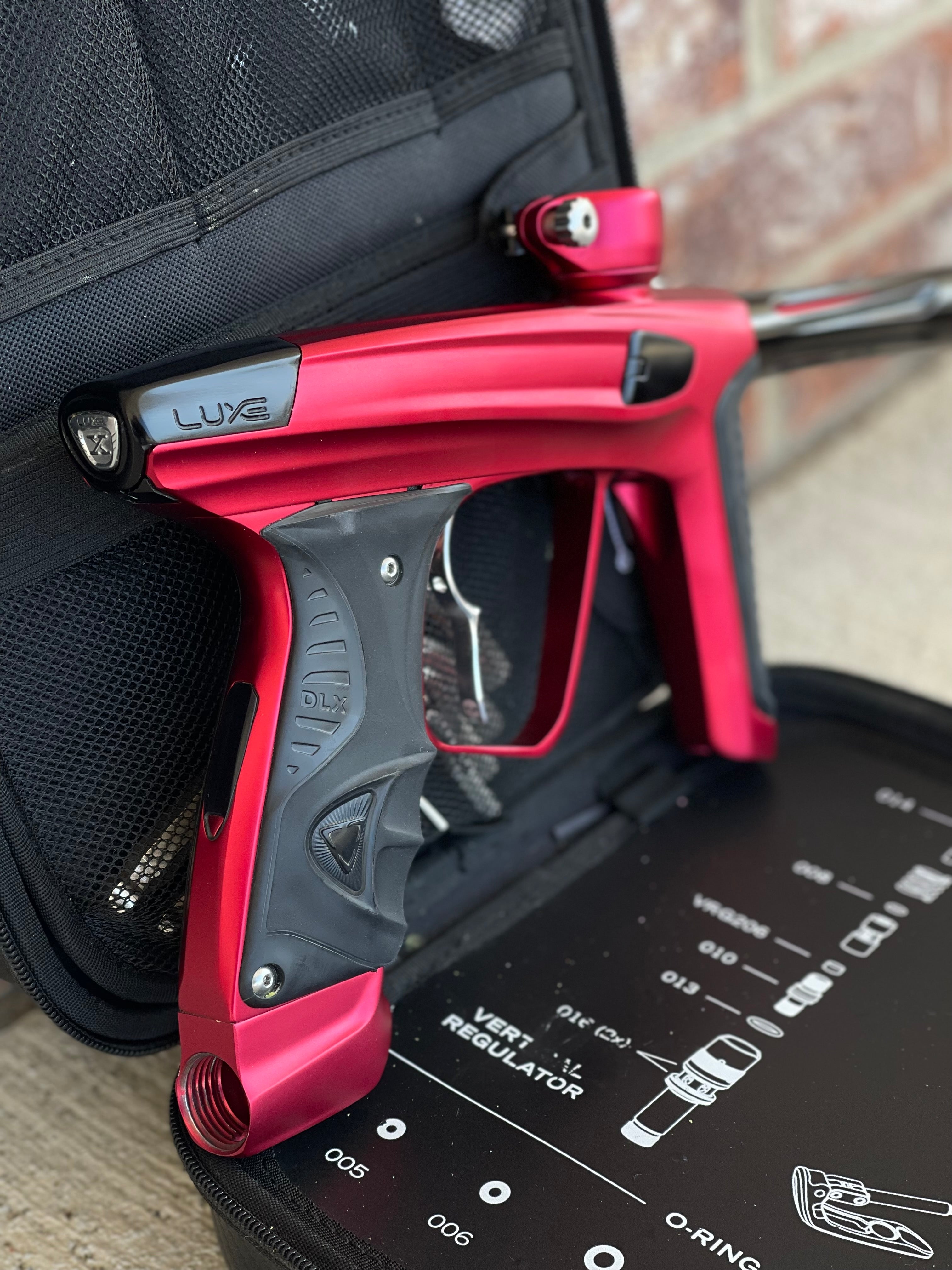 Used DLX Luxe X Paintball Gun - Dust Red w/ Infamous Deuce Trigger