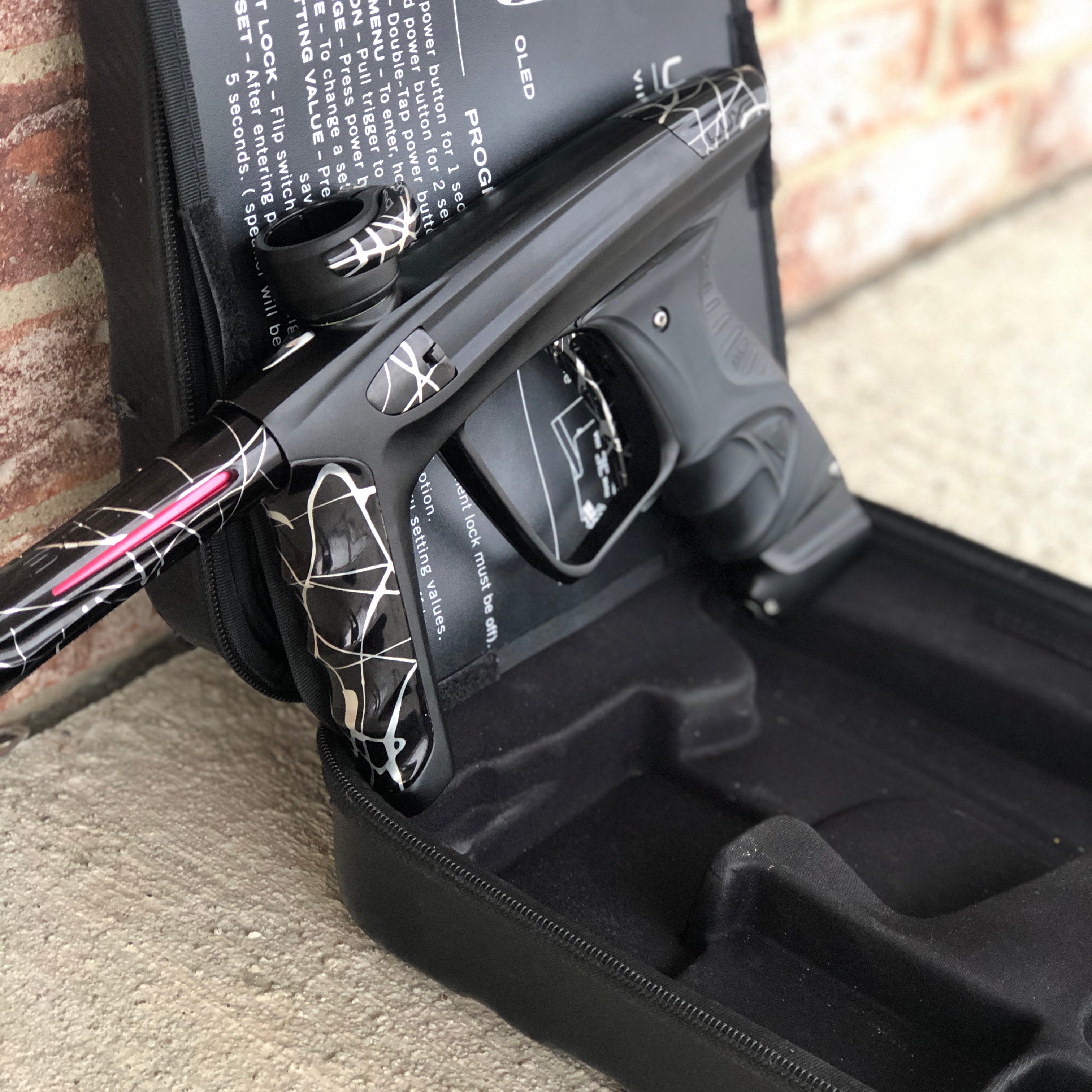 Used DLX Luxe X Paintball Gun - Dust Black w/ Black & Silver Splash Accents