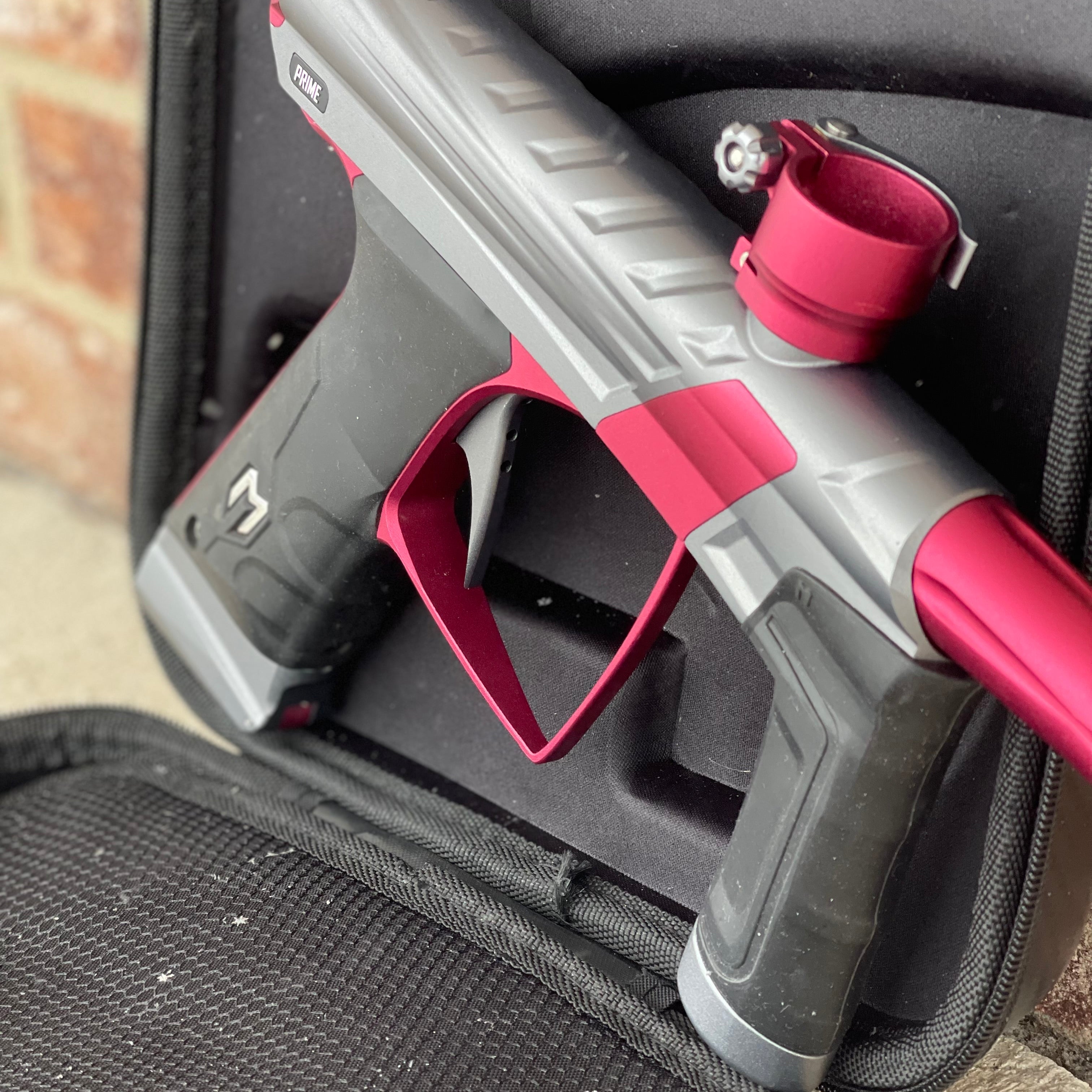 Used MacDev Prime XTS Paintball Gun - Dust Grey / Dust Red w/ additional Stock Deuce Trigger