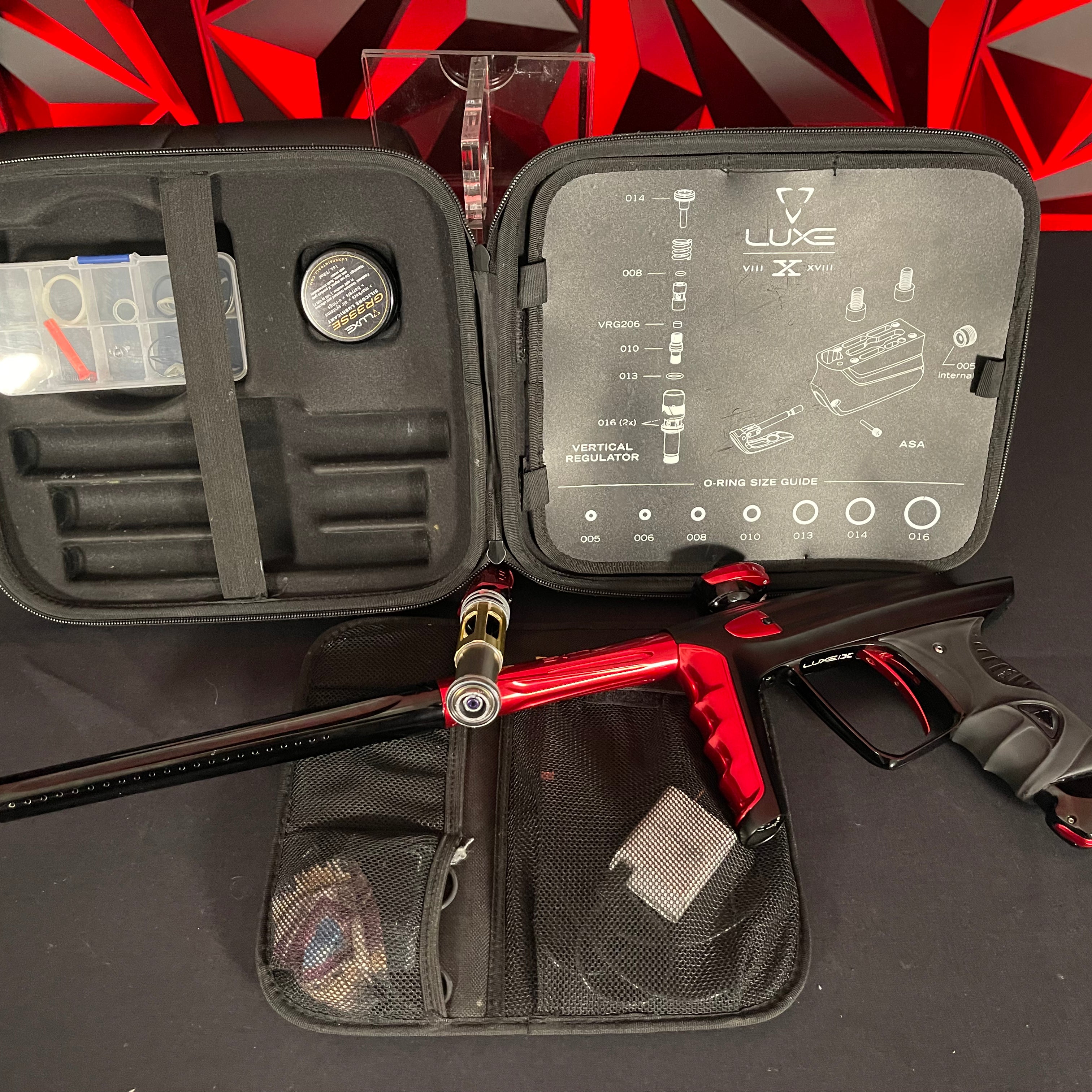 Used DLX Luxe X Paintball Gun - Dust Black Body/Gloss Trigger Frame/Red Accents