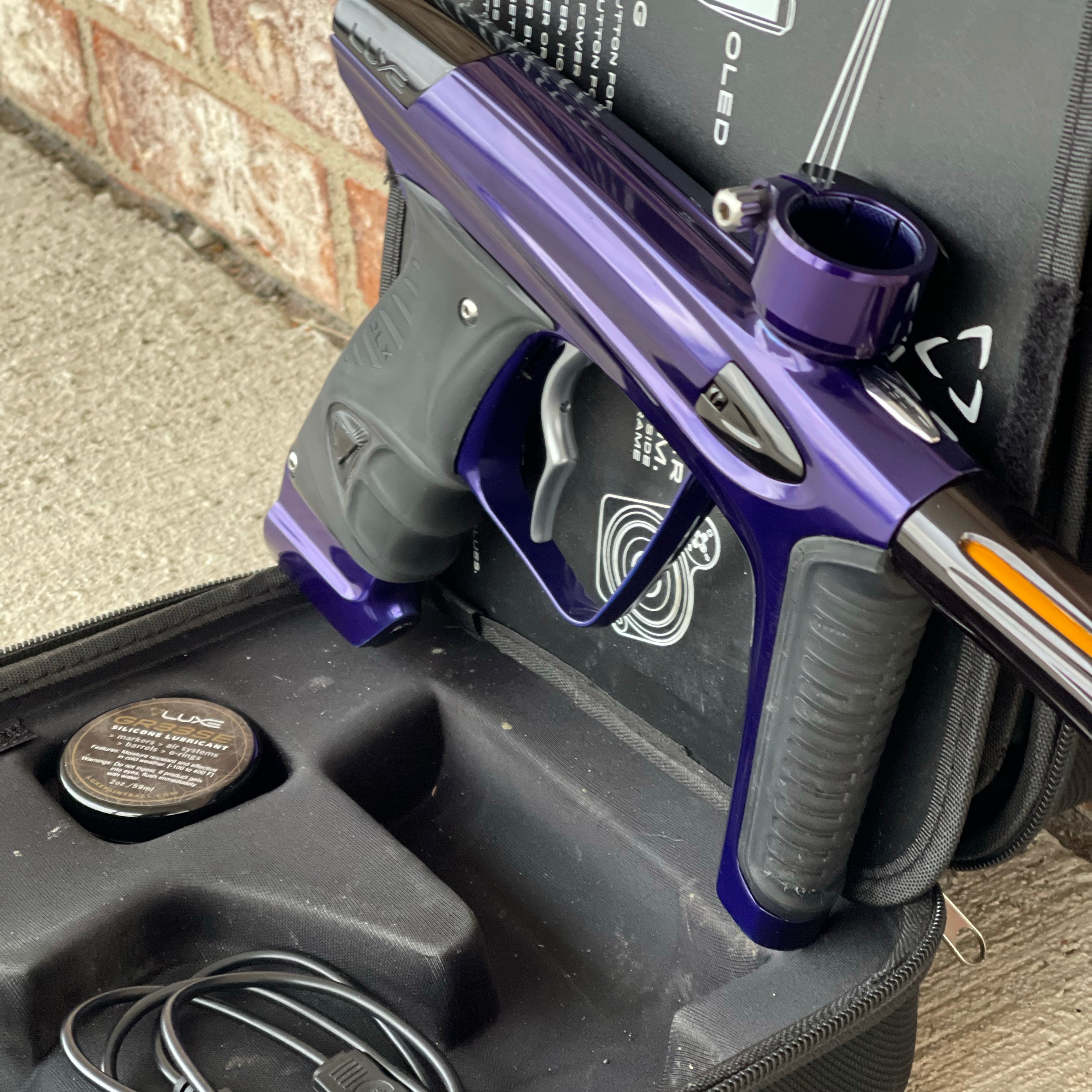 Used DLX Luxe Ice Paintball Gun - Purple / Black