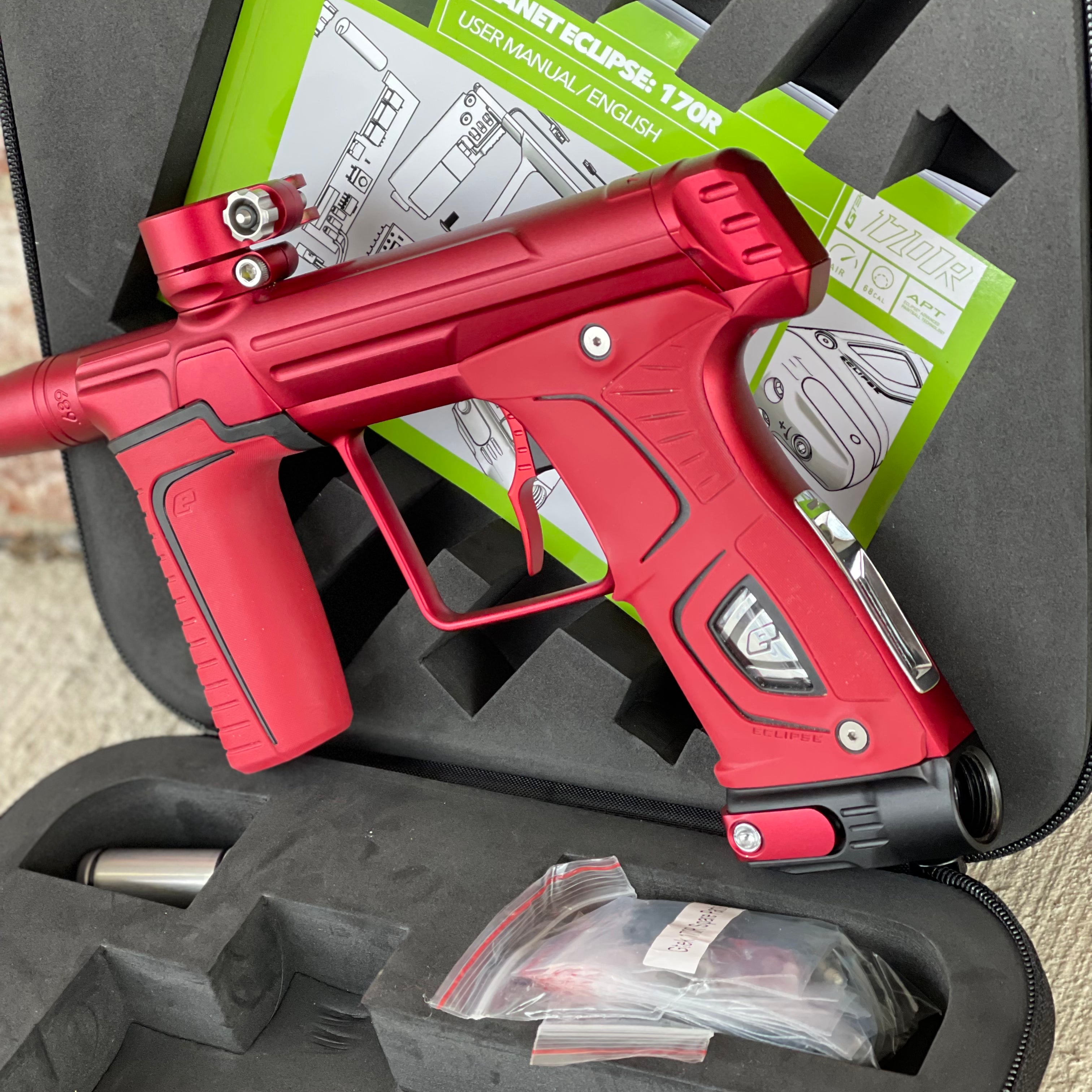 Used Planet Eclipse 170R Paintball Gun - Dust Red w/Red Grip Kit, Deuce Trigger, and ST3 Bolt