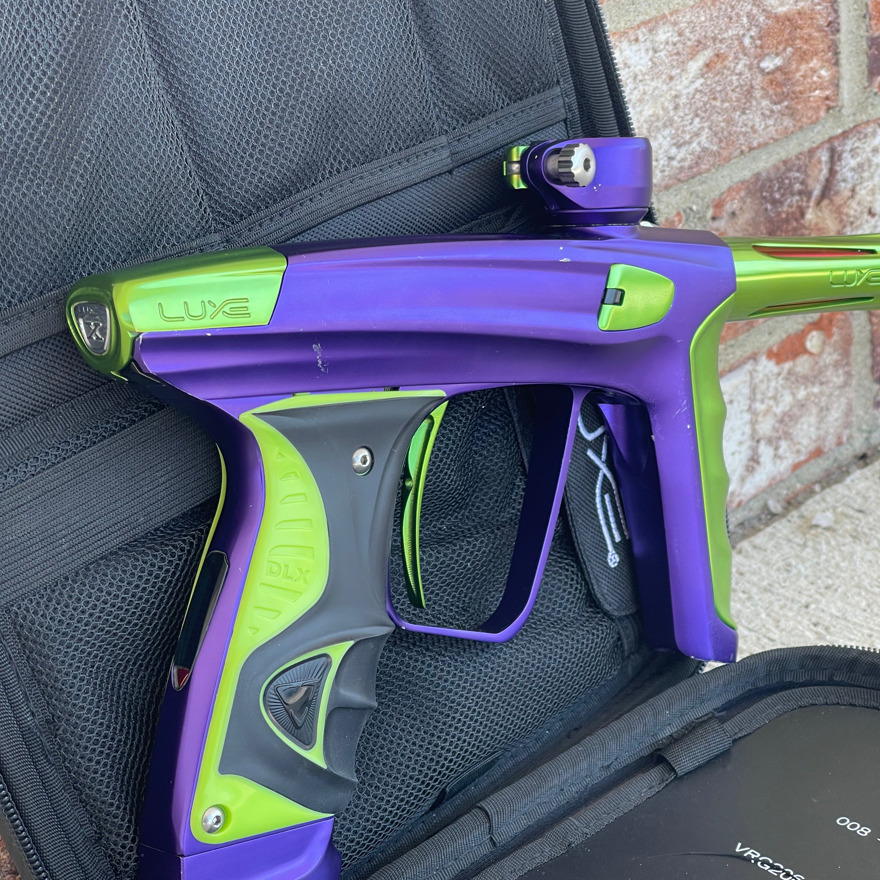 Used DLX Luxe X Paintball Gun - Dust Purple / Polished Green