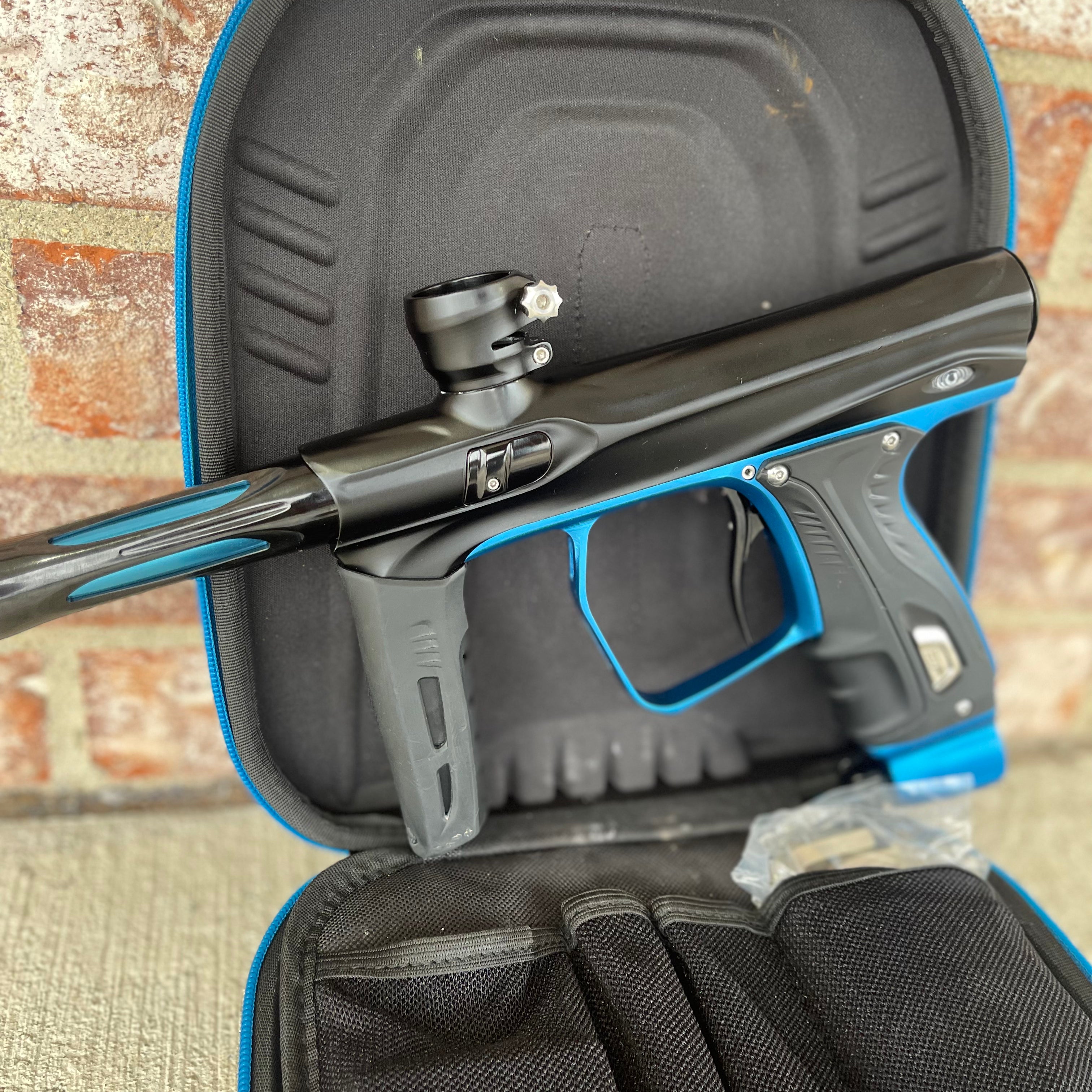 Used Shocker XLS Paintball Gun - Dust Black w/ Blue Trigger Frame