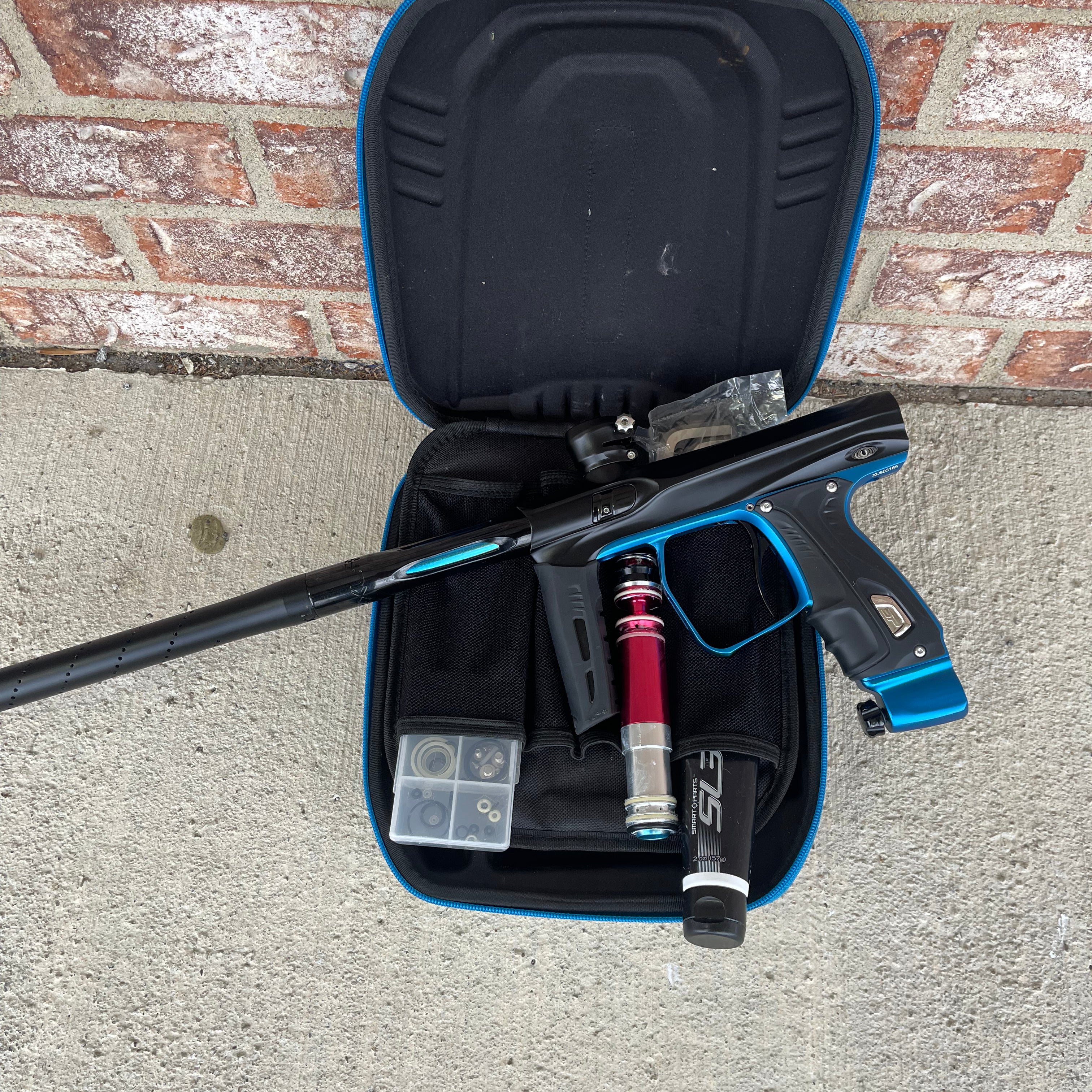 Used Shocker XLS Paintball Gun - Dust Black w/ Blue Trigger Frame