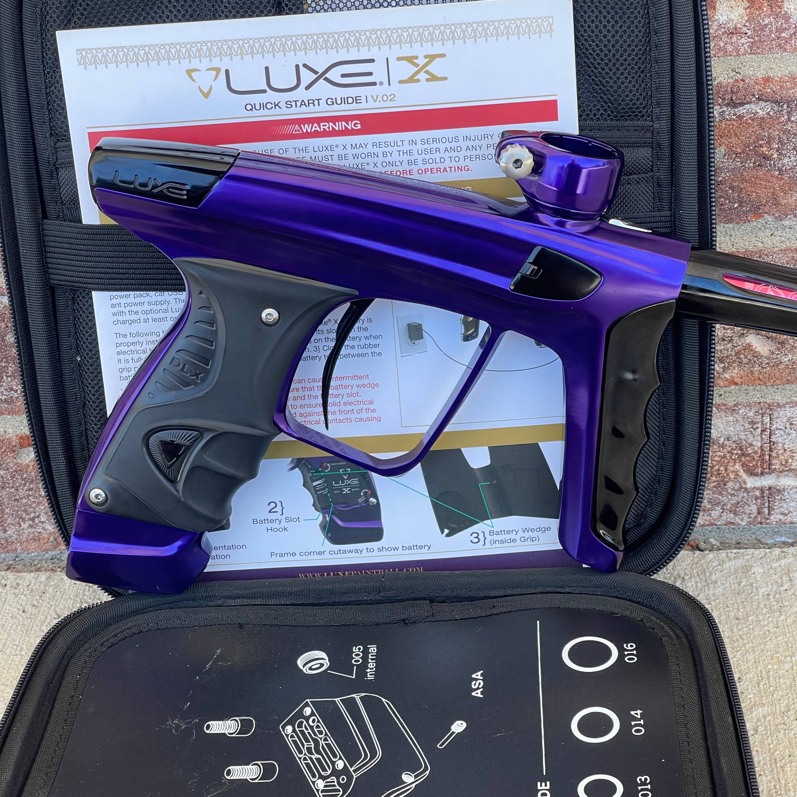 Used DLX Luxe X Paintball Gun - Gloss Purple / Gloss Black