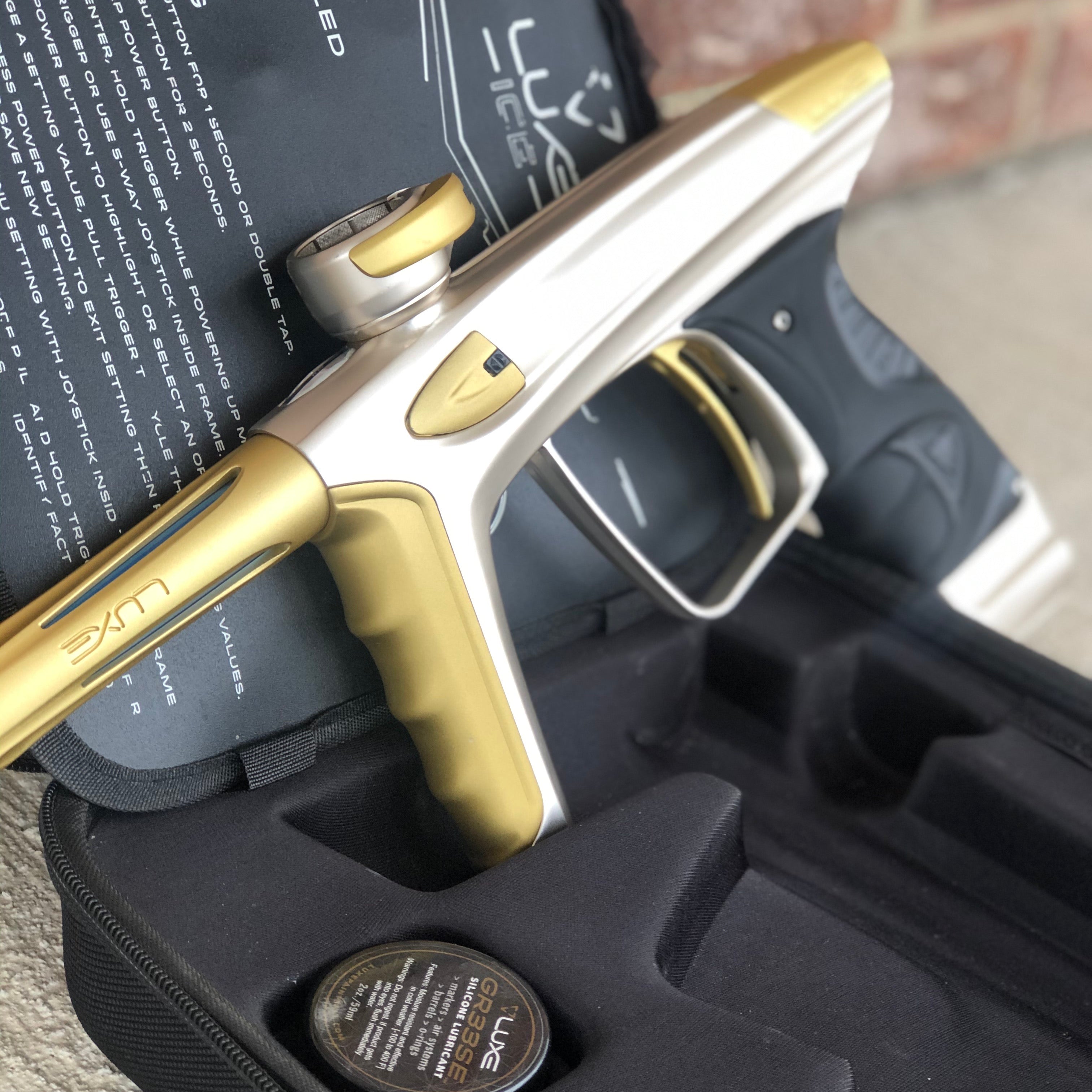 Used DLX Luxe Ice Paintball Gun - Silver / Dust Gold
