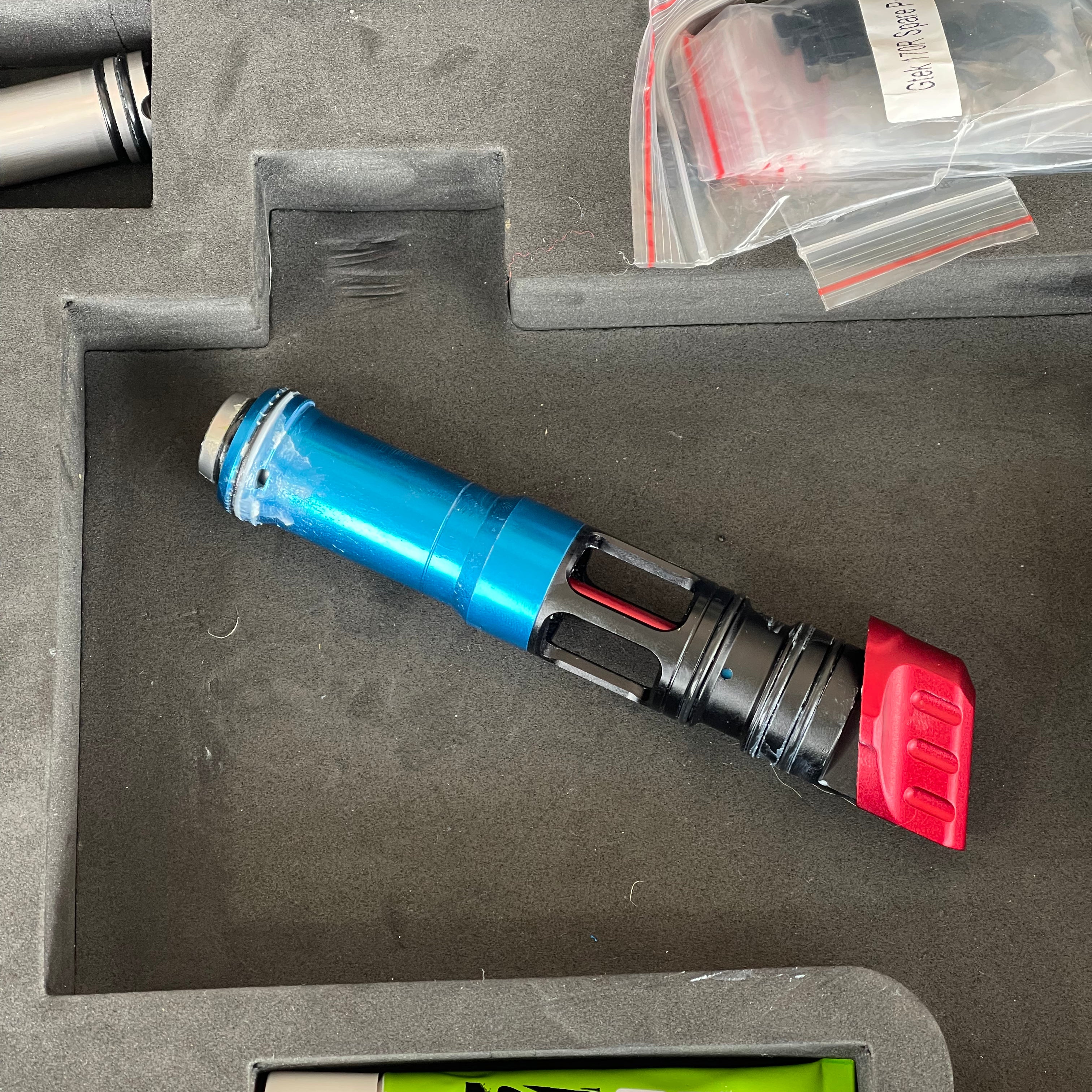 Used Planet Eclipse 170R Paintball Gun - Dust Red w/Red Grip Kit, Deuce Trigger, and ST3 Bolt