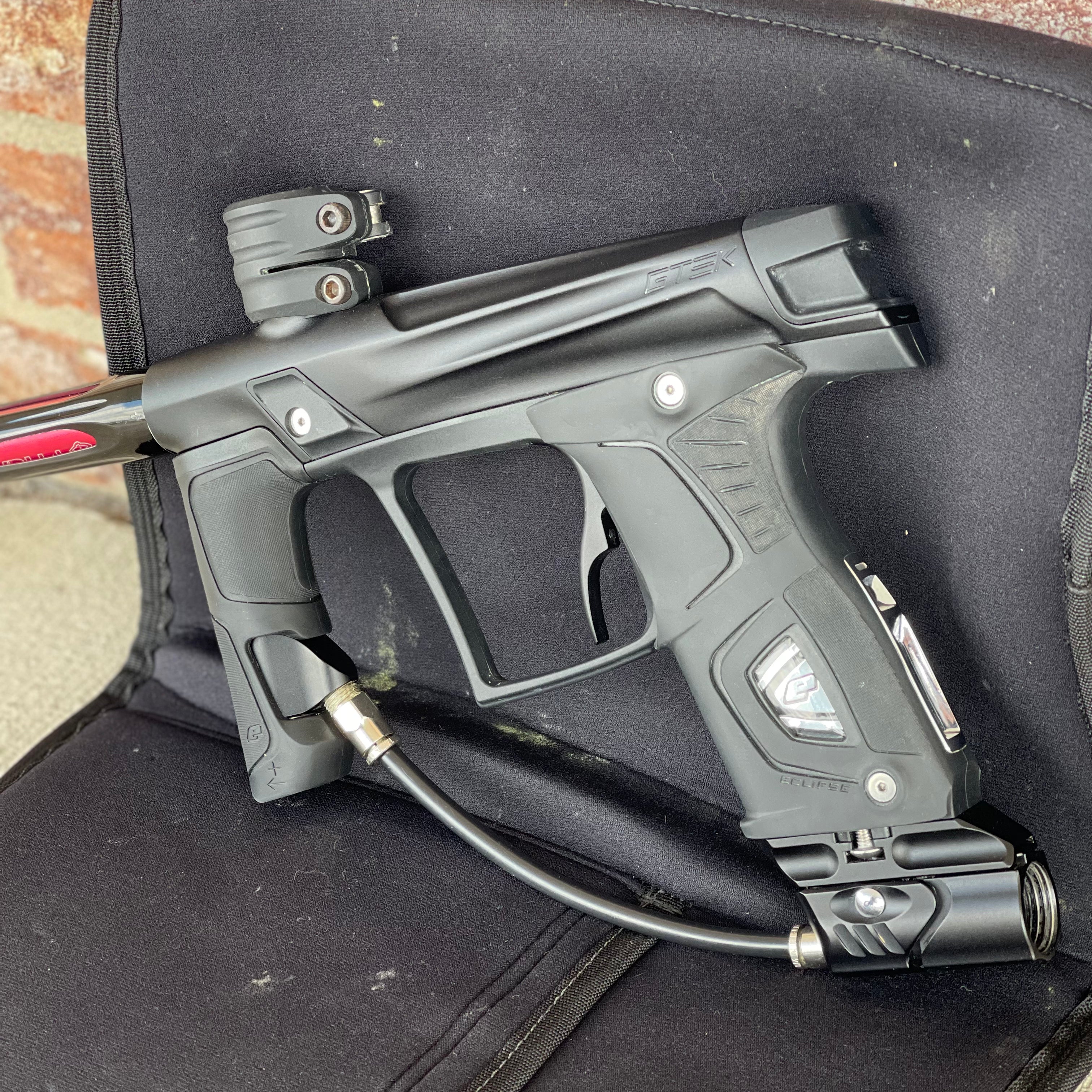 Used Planet Eclipse Gtek OLED Paintball Marker- Black with Gmek Frame, Deadlywinds 14" Carbon Fiber Tip, POPS ASA w/Dropdown Rail