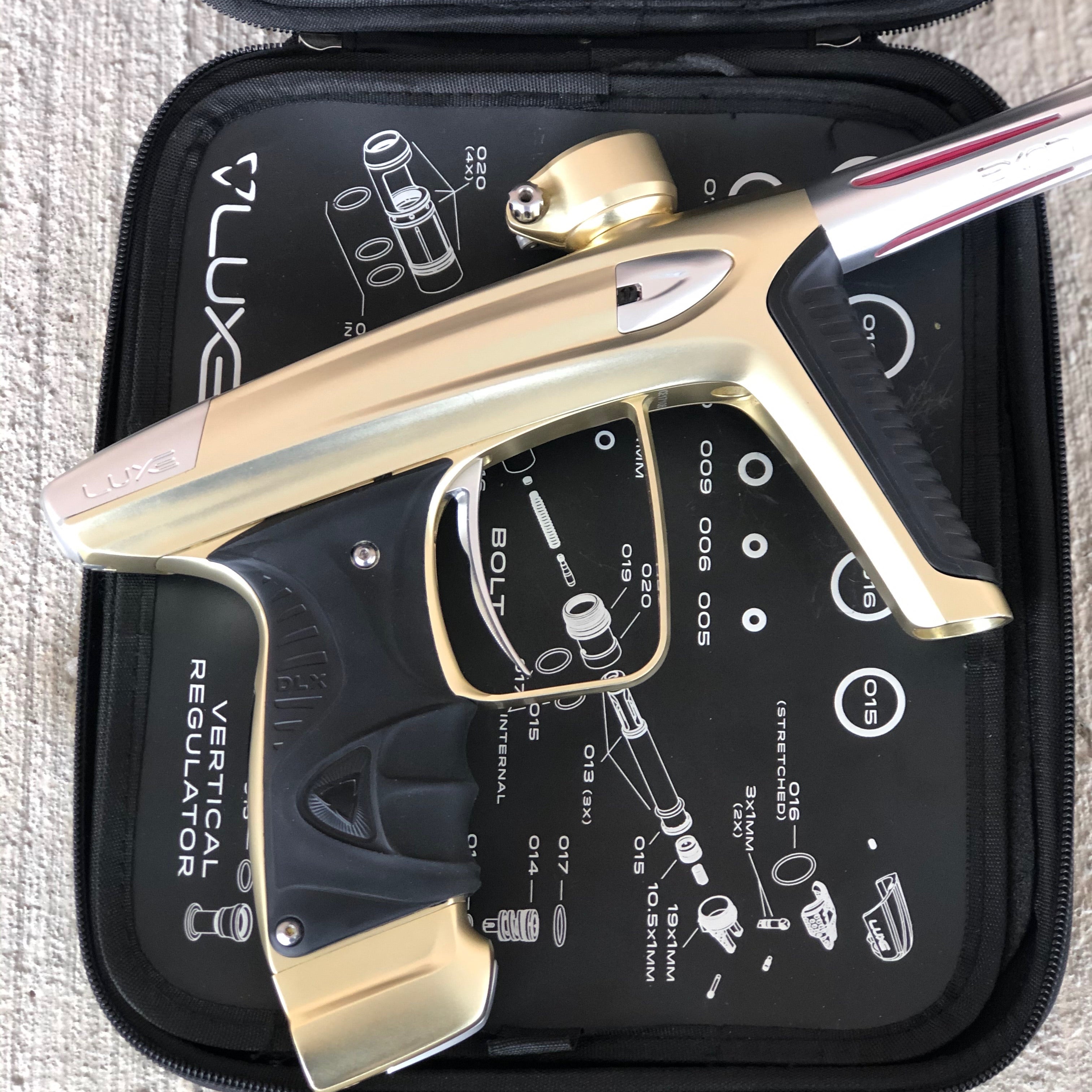 Used DLX Luxe Ice Paintball Gun - Dust Gold/Silver