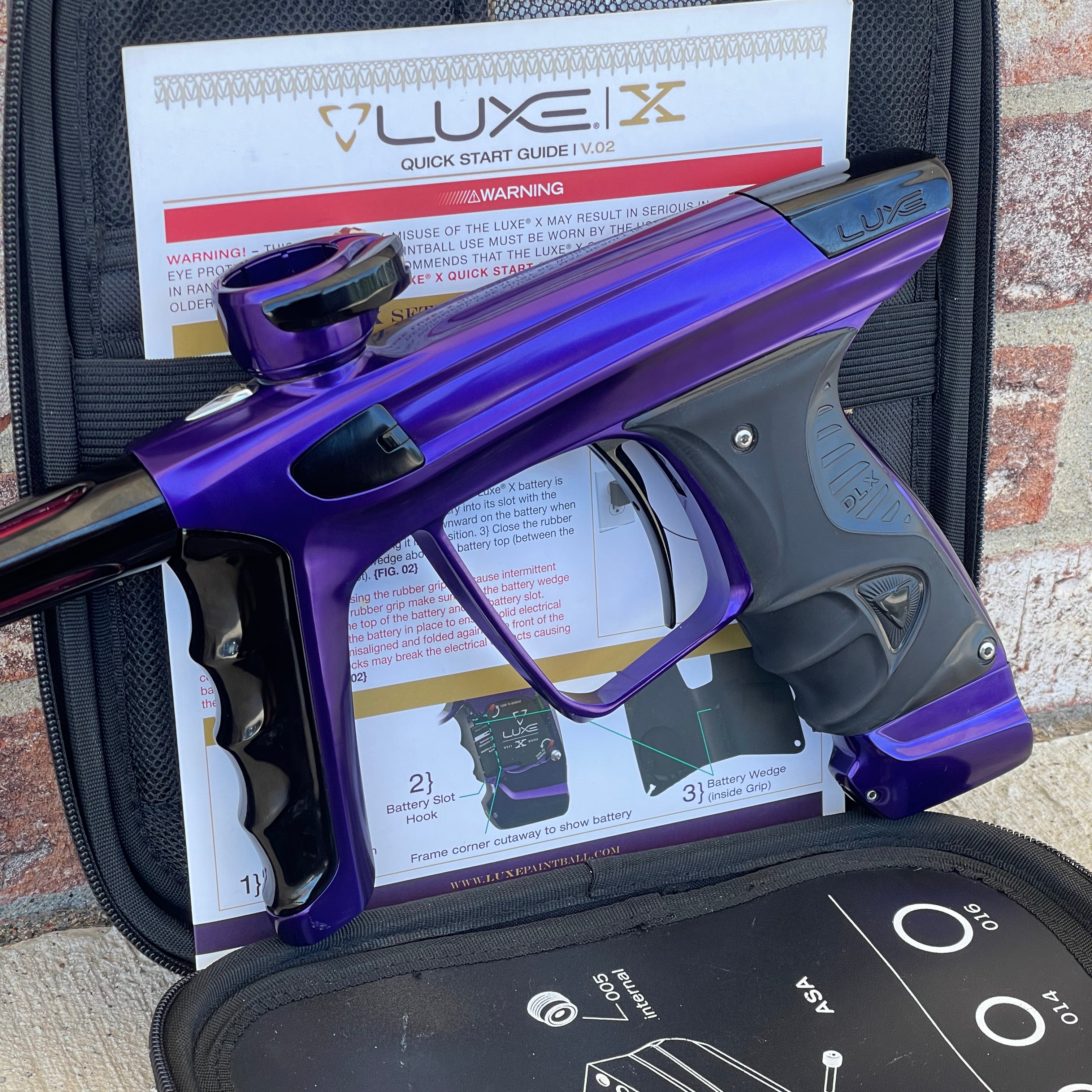 Used DLX Luxe X Paintball Gun - Gloss Purple / Gloss Black