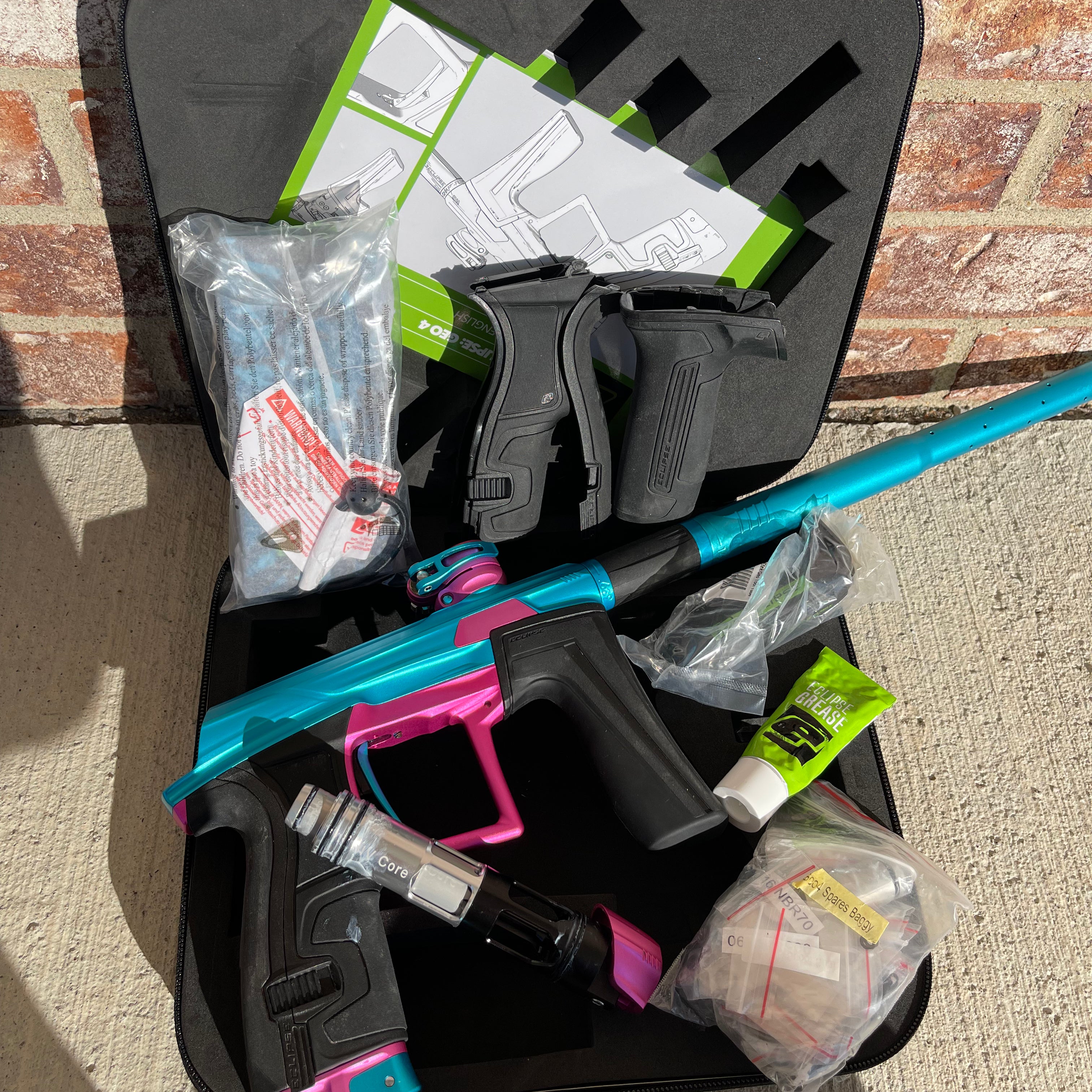 Used Planet Eclipse Geo 4 Paintball Gun - Teal/Pink
