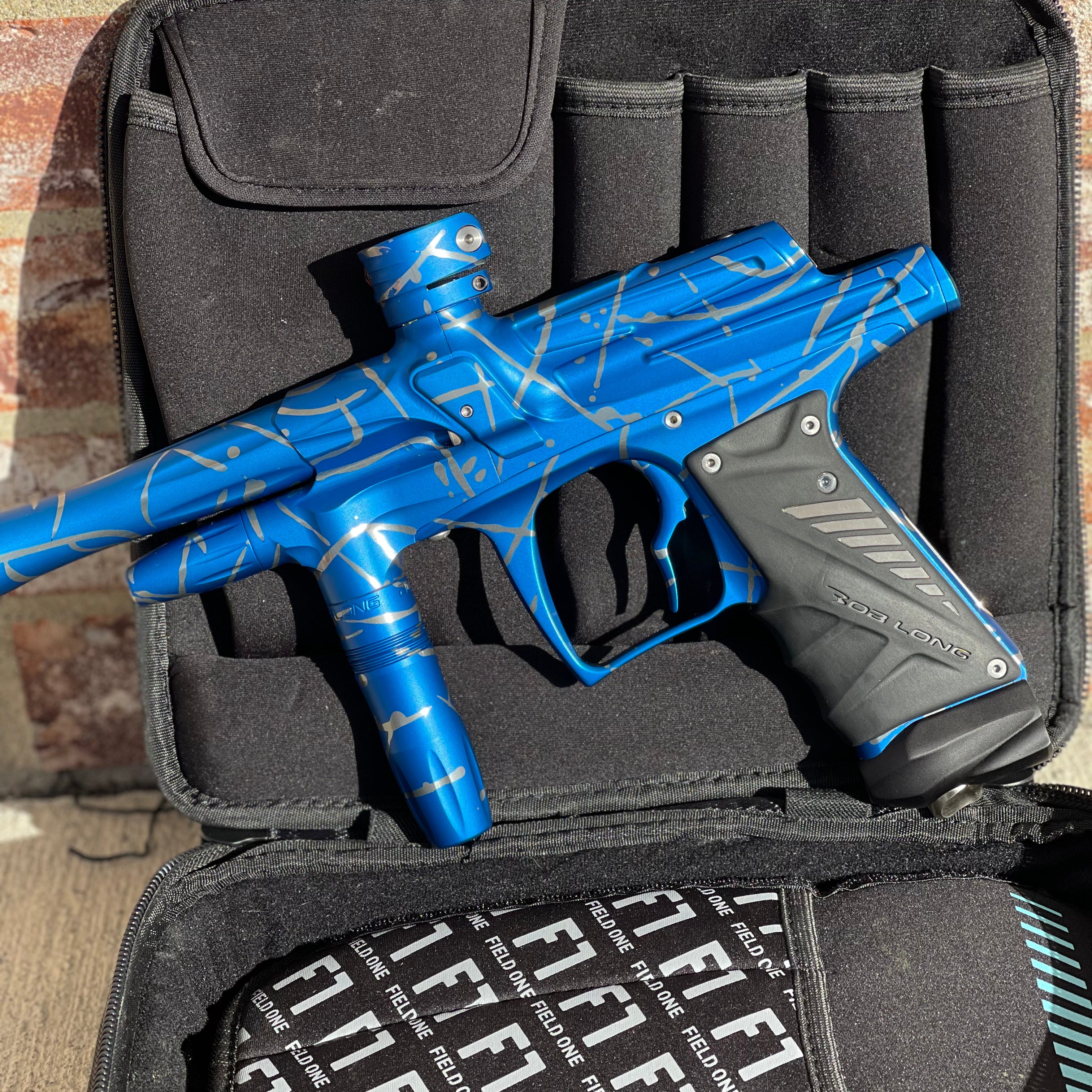 Used Bob Long G6R OLED Paintball Gun - Z Cut - Blue/Silver Splash