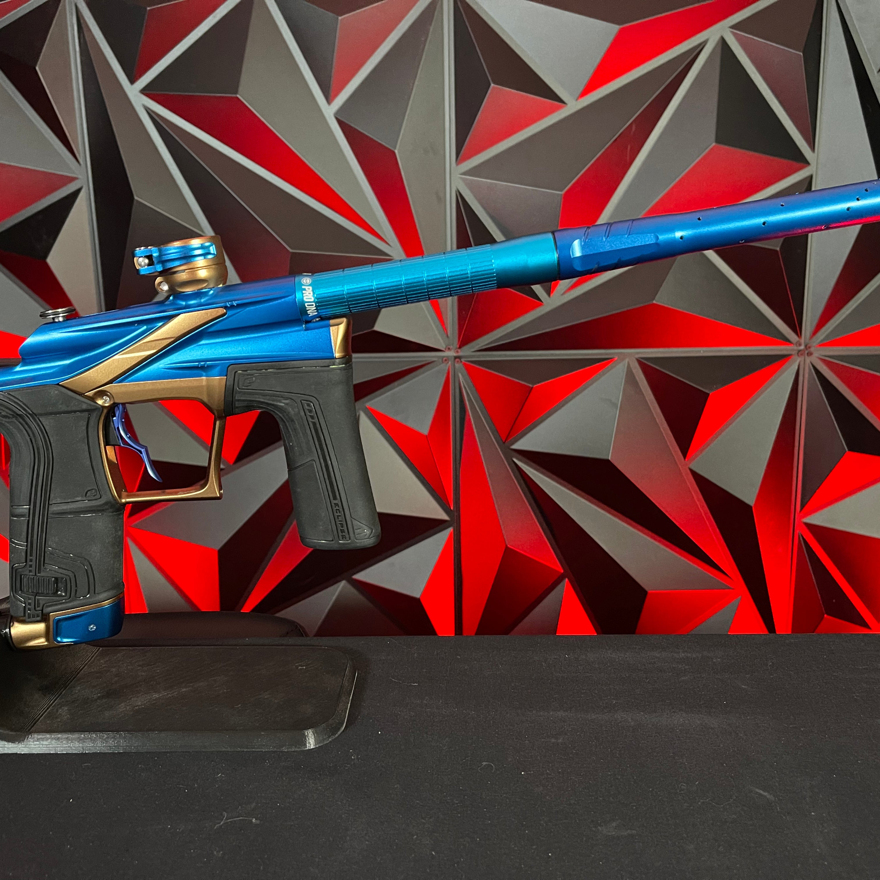 Used Planet Eclipse LV2 Paintball Gun - Blue/Bronze w/ Silencio Power Grip Back *Houston Heat Signed Case*