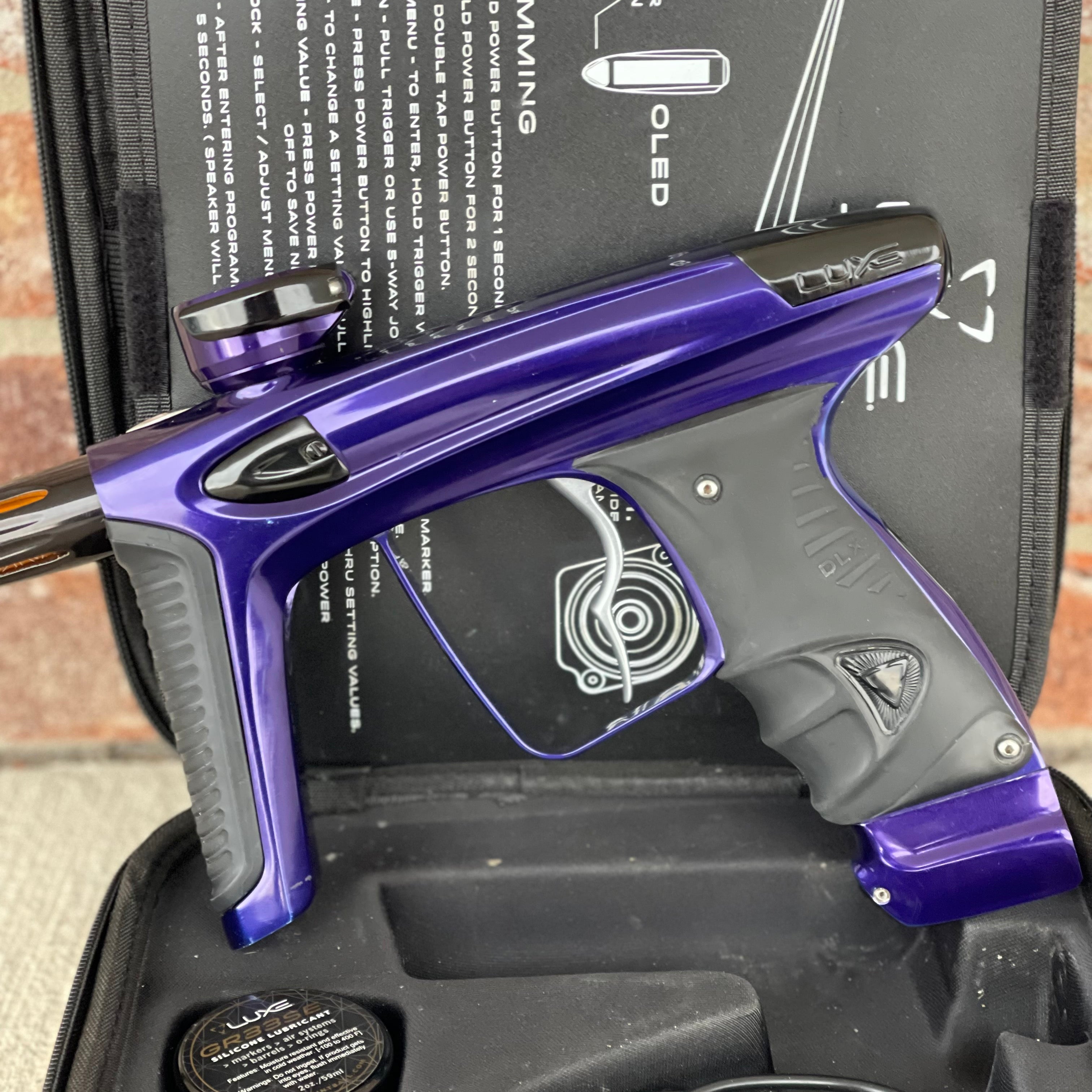 Used DLX Luxe Ice Paintball Gun - Purple / Black