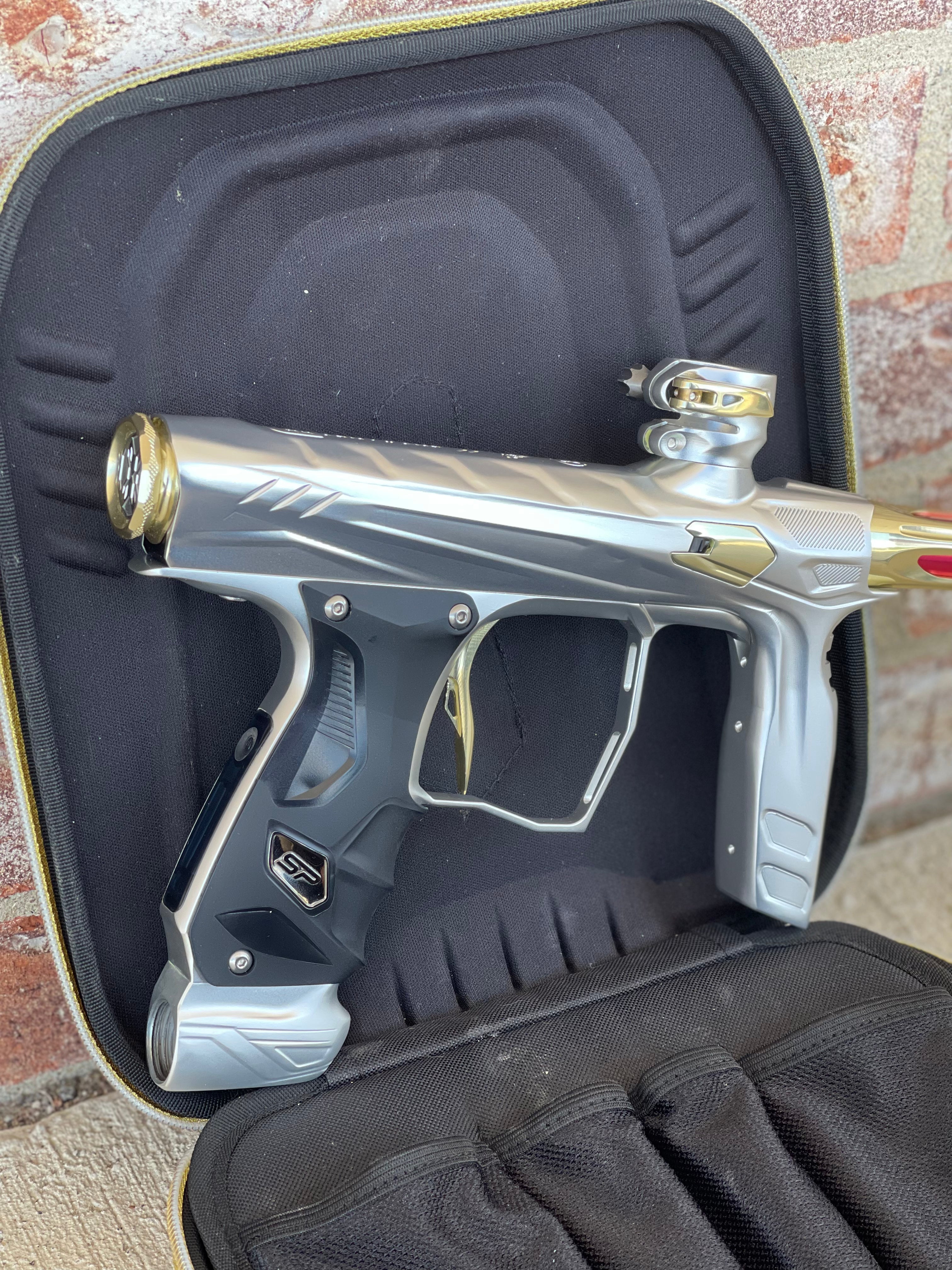 Used HK Army Shocker Amp Paintball Gun - Silver/ Gold
