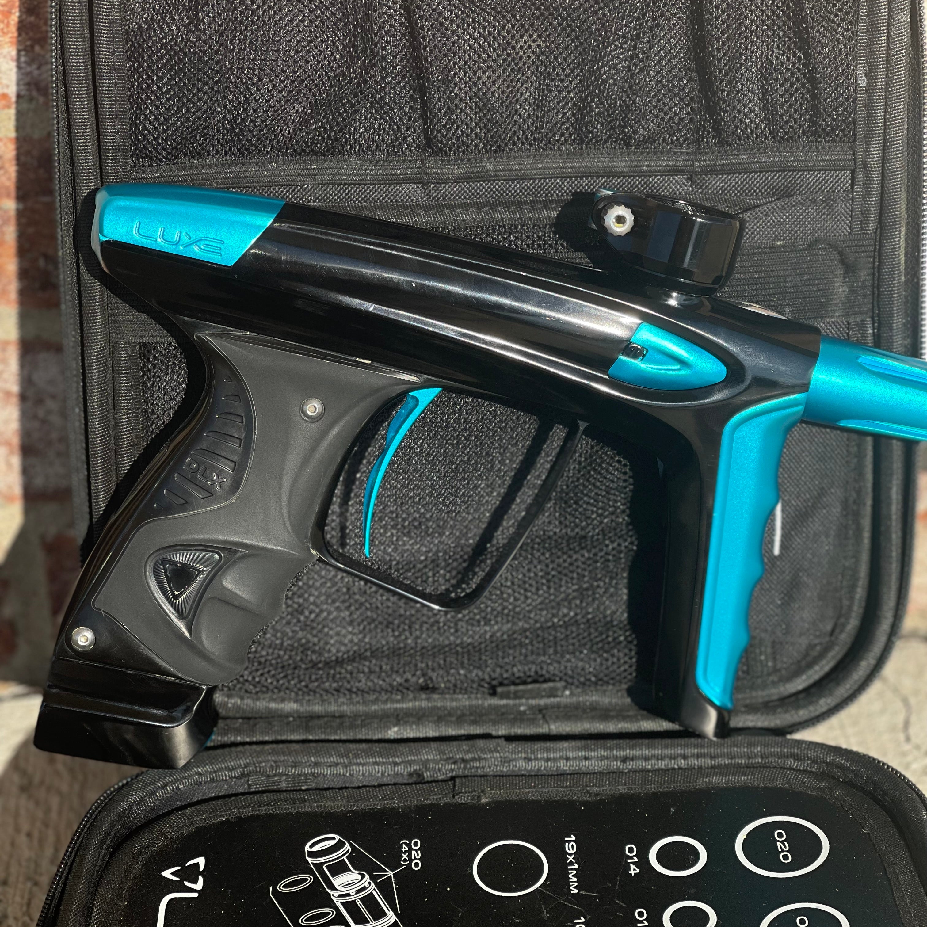 Used DLX Luxe Ice Paintball Gun - Polished Black / Dust Teal