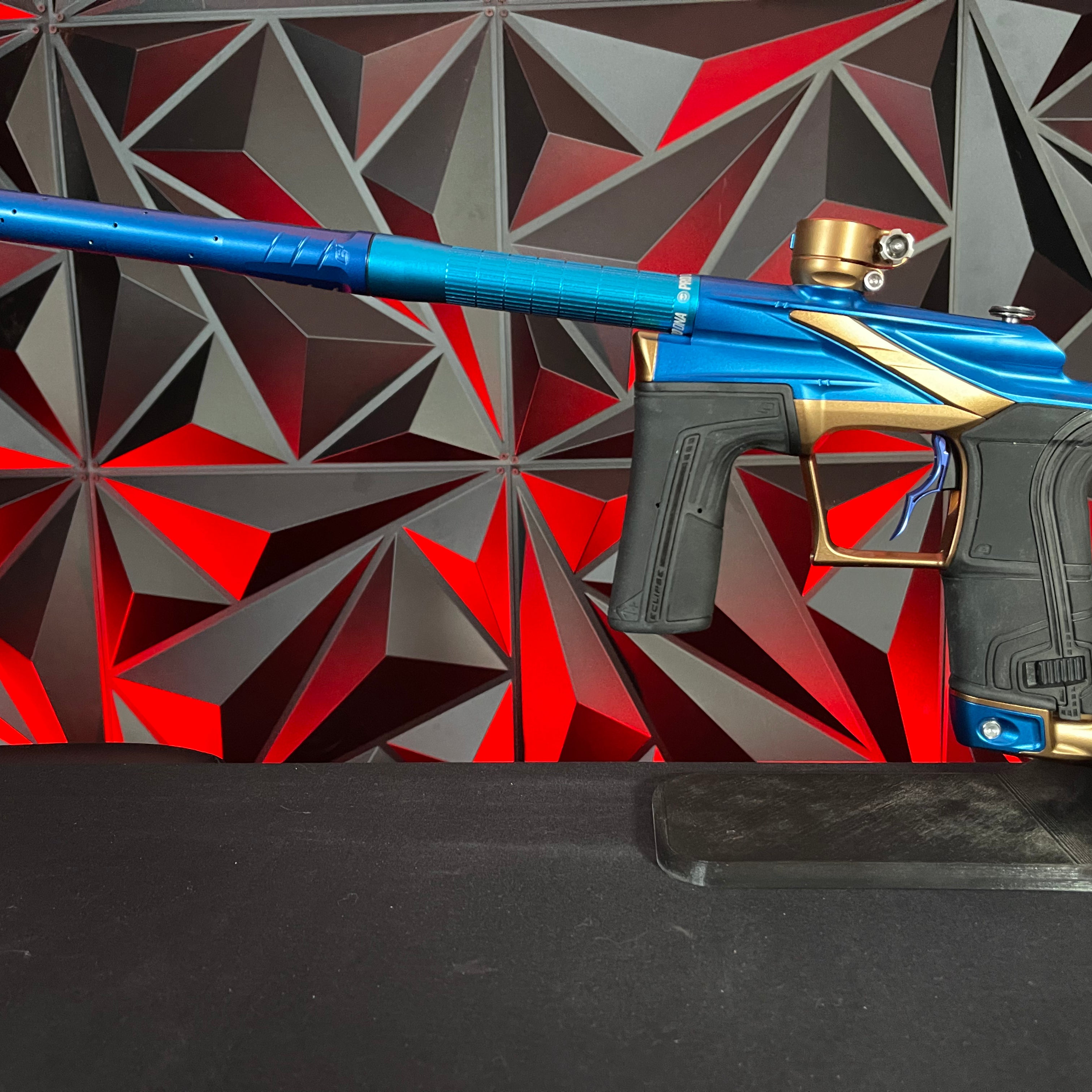 Used Planet Eclipse LV2 Paintball Gun - Blue/Bronze w/ Silencio Power Grip Back *Houston Heat Signed Case*