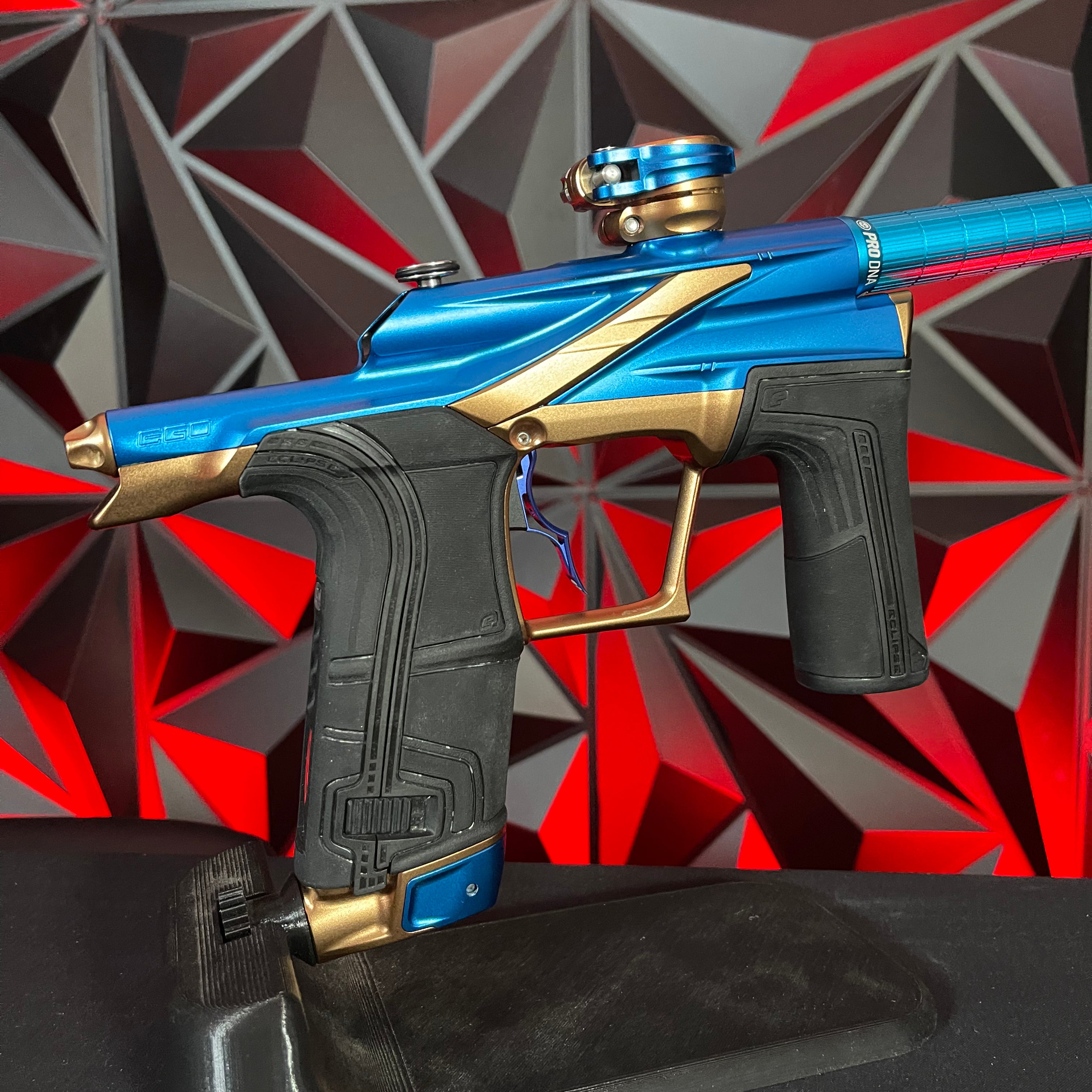 Used Planet Eclipse LV2 Paintball Gun - Blue/Bronze w/ Silencio Power Grip Back *Houston Heat Signed Case*