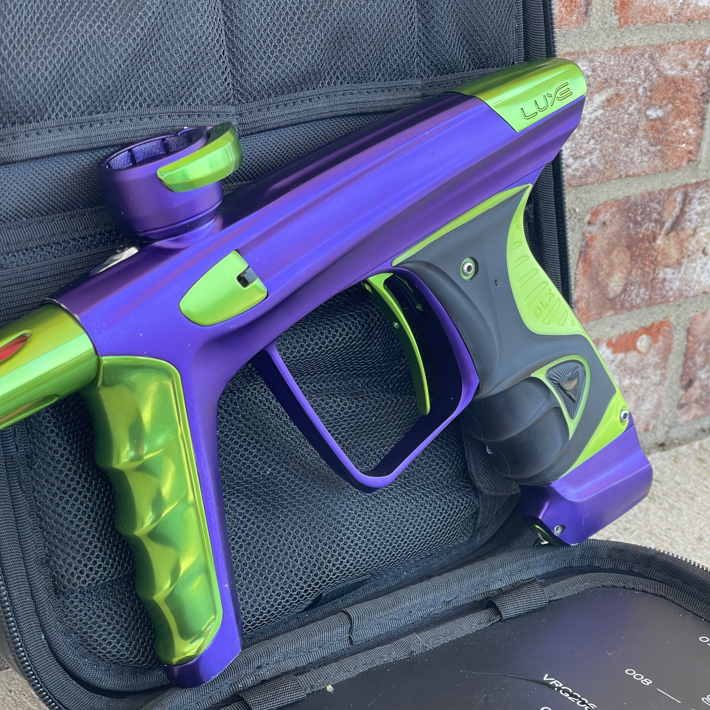 Used DLX Luxe X Paintball Gun - Dust Purple / Polished Green