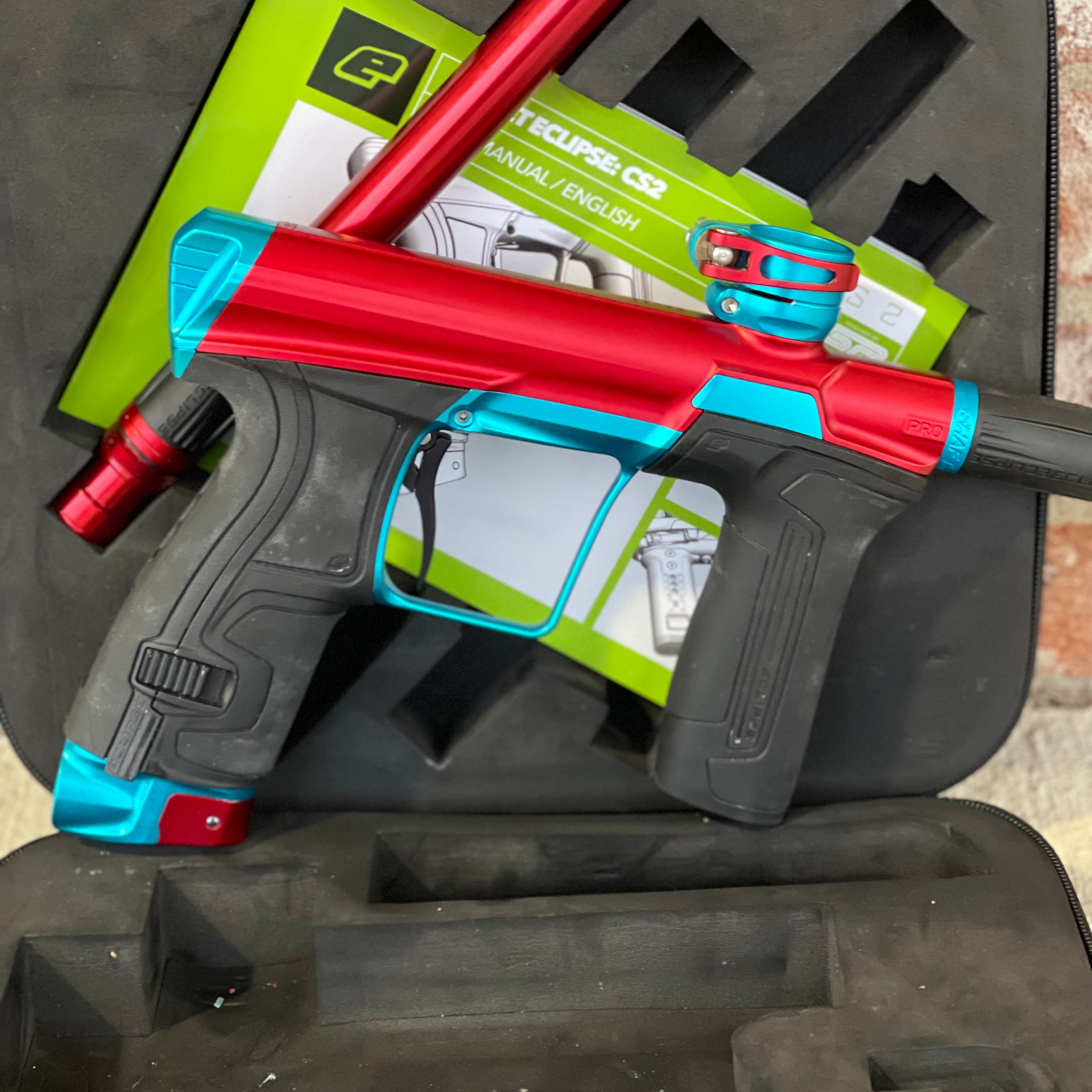 Used Planet Eclipse CS2 Pro Paintball Gun - Red/Teal