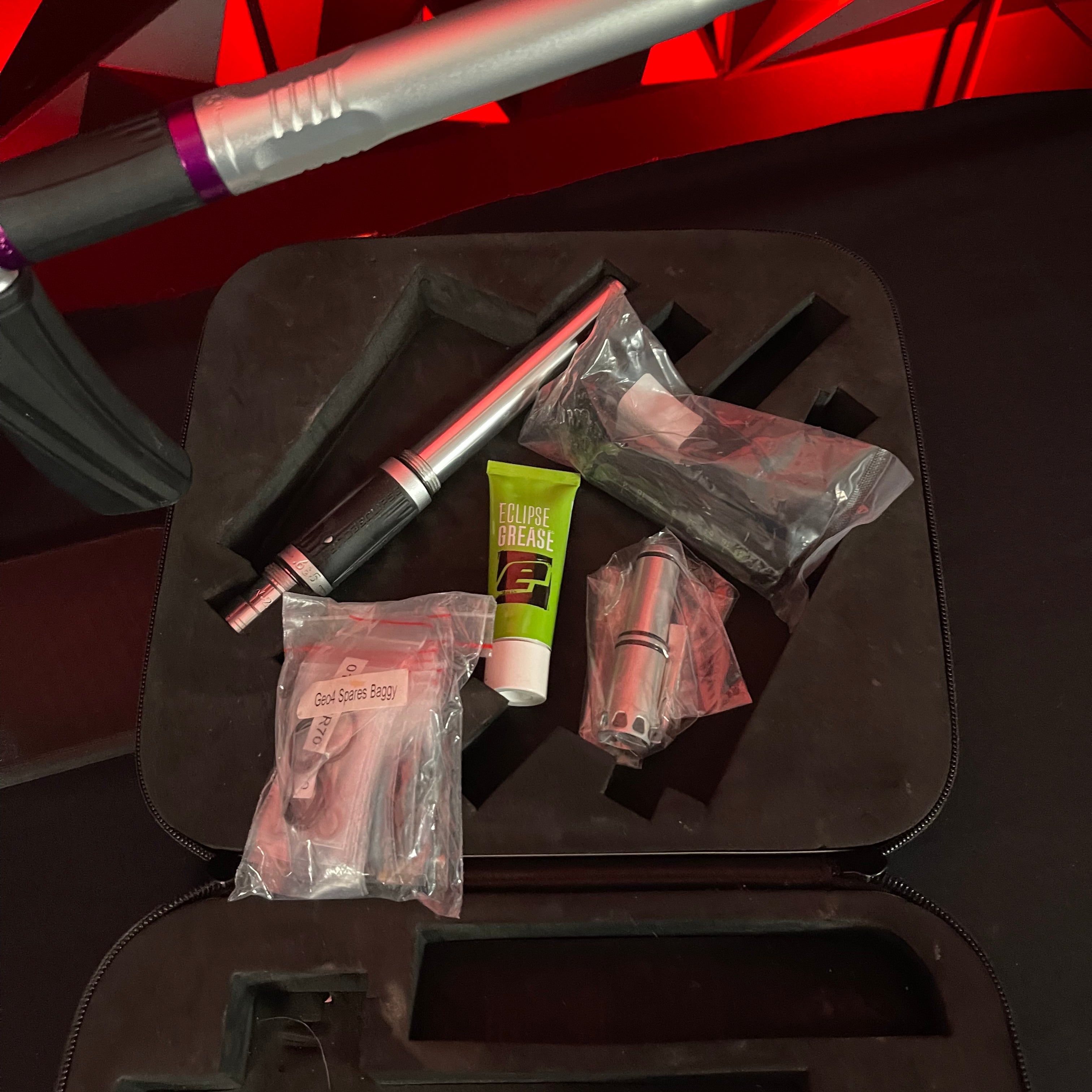 Used Planet Eclipse Geo 4 Paintball Gun - Silver/Purple w/2 FL Inserts