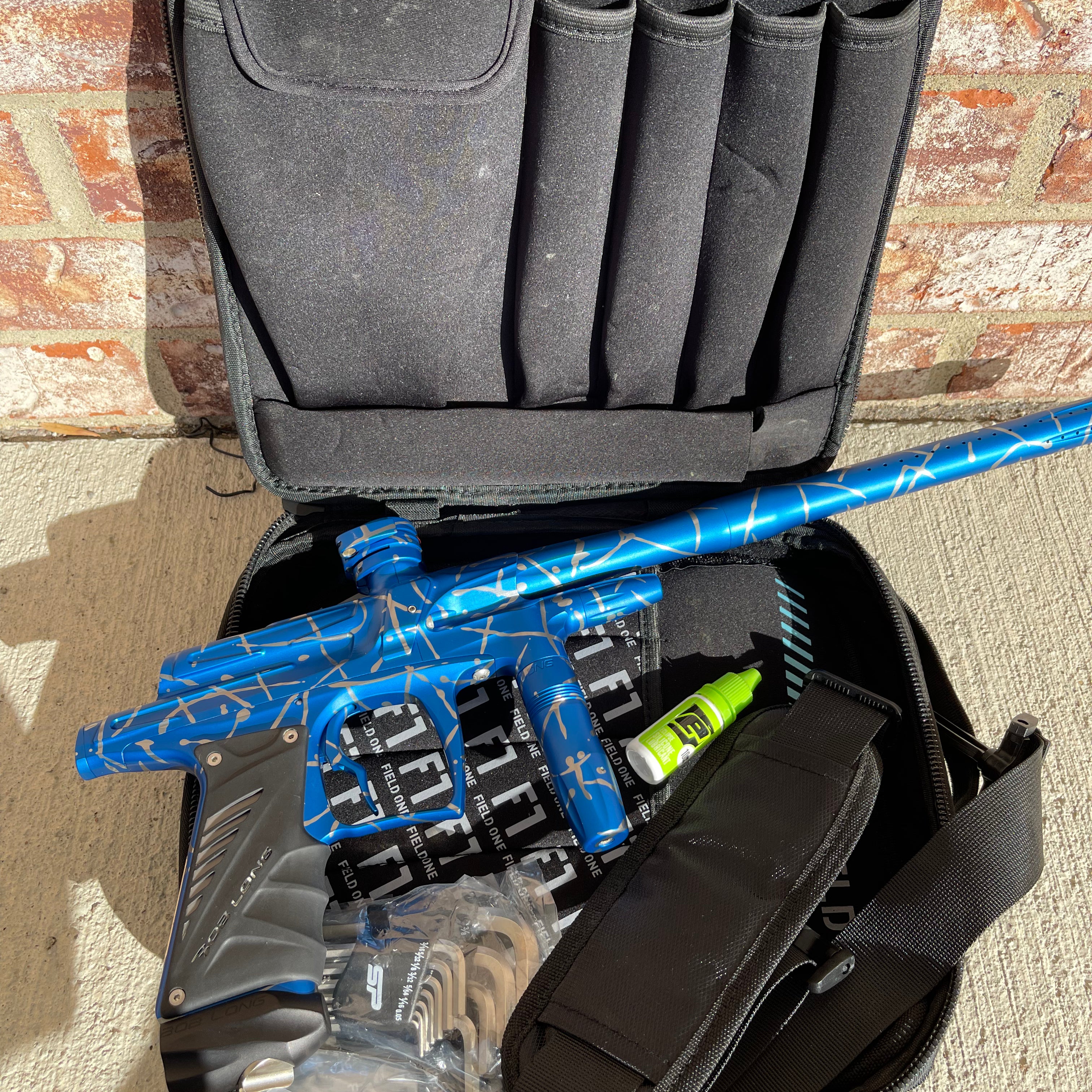 Used Bob Long G6R OLED Paintball Gun - Z Cut - Blue/Silver Splash