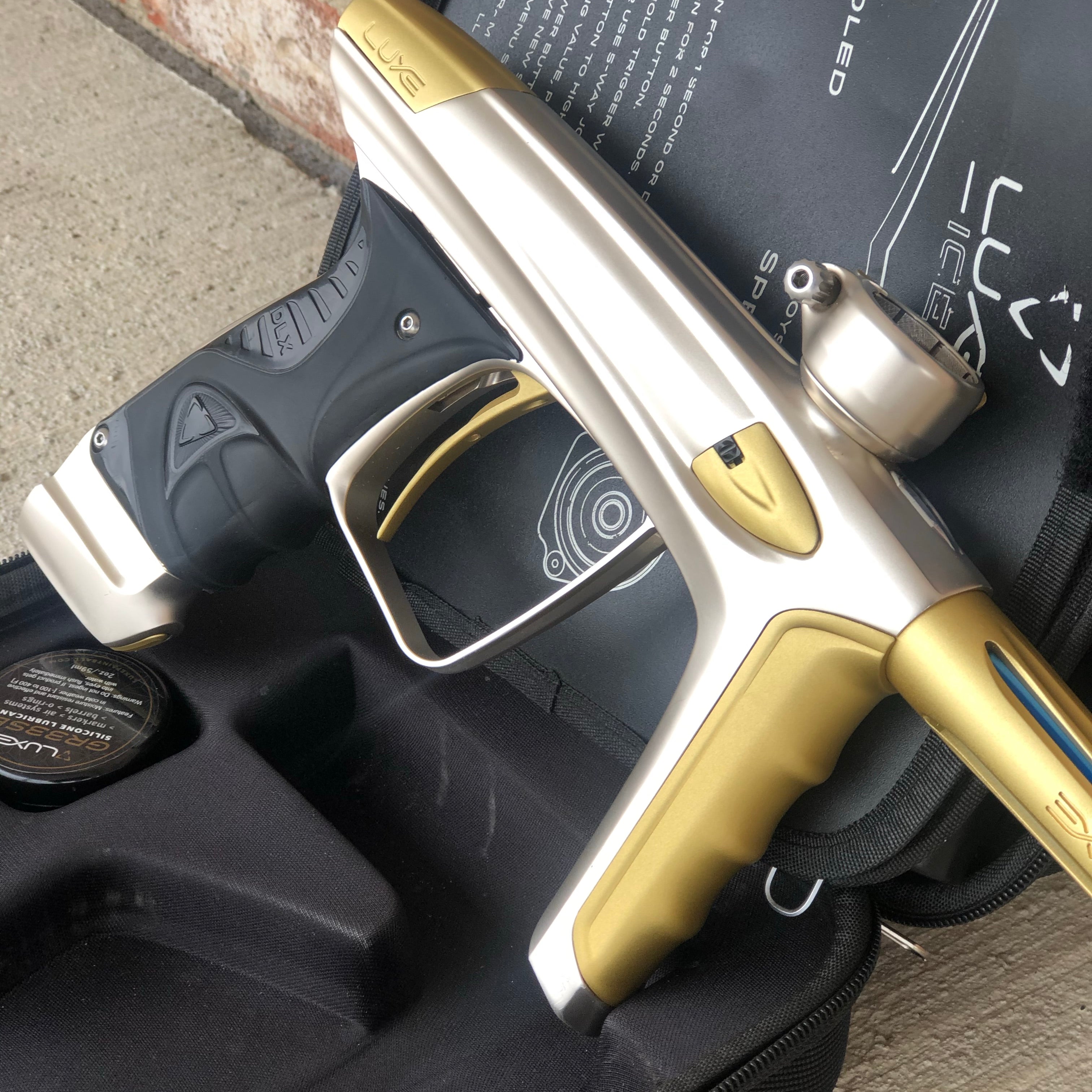 Used DLX Luxe Ice Paintball Gun - Silver / Dust Gold