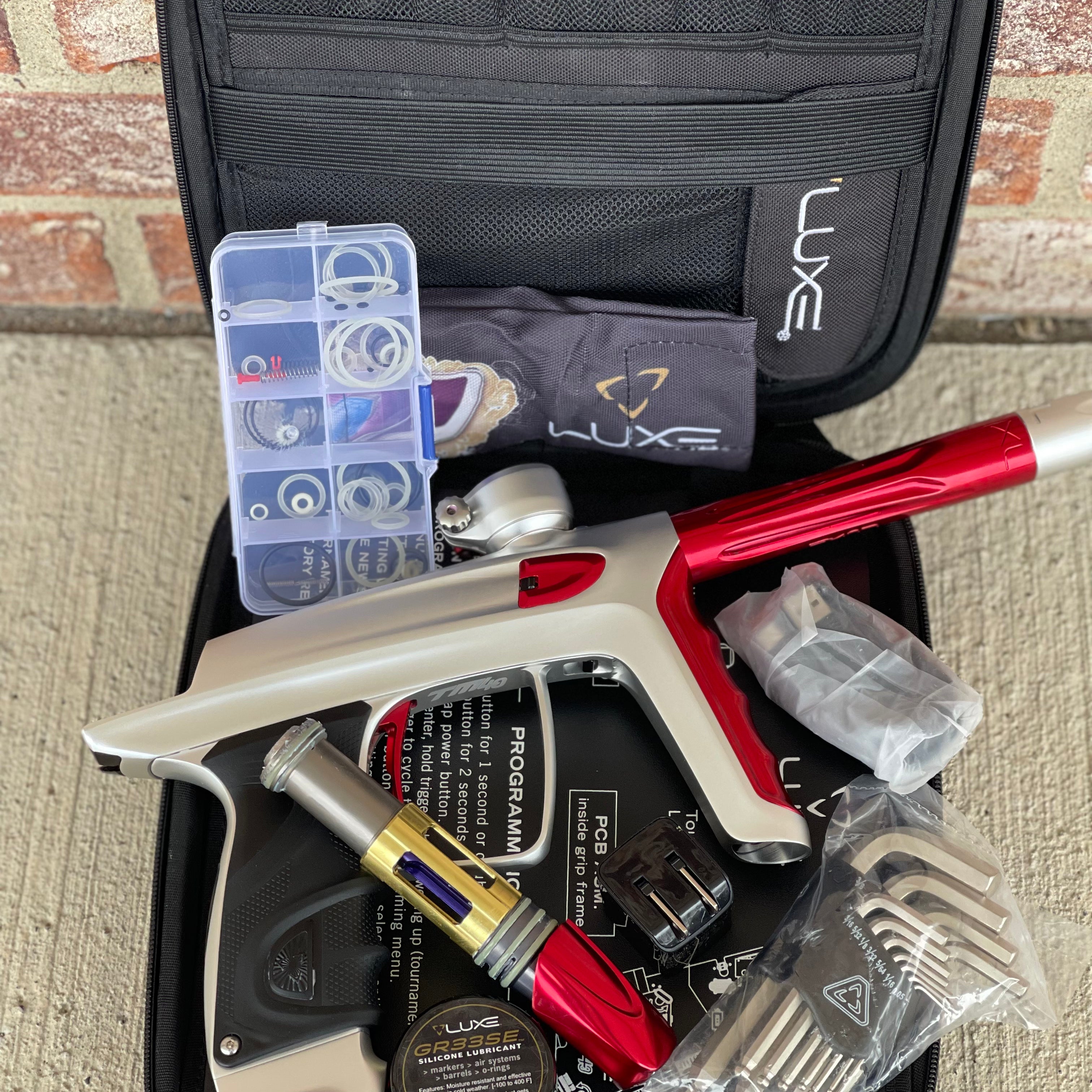 Used DLX Luxe TM40 Paintball Gun - Dust White / Polished Red