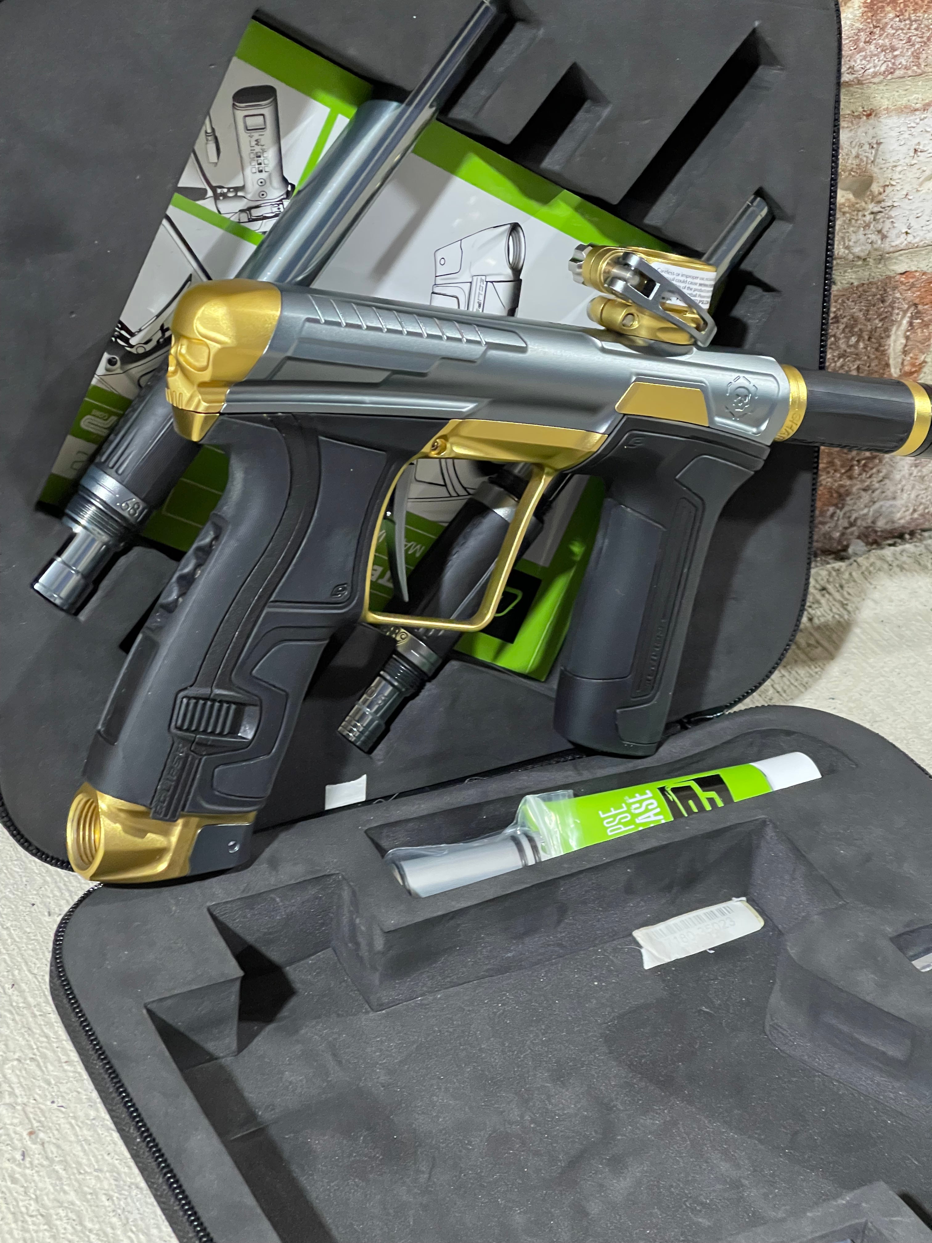 Used Infamous / Planet Eclipse CS2 Paintball Gun - Grey / Gold w/ 3 FL Inserts