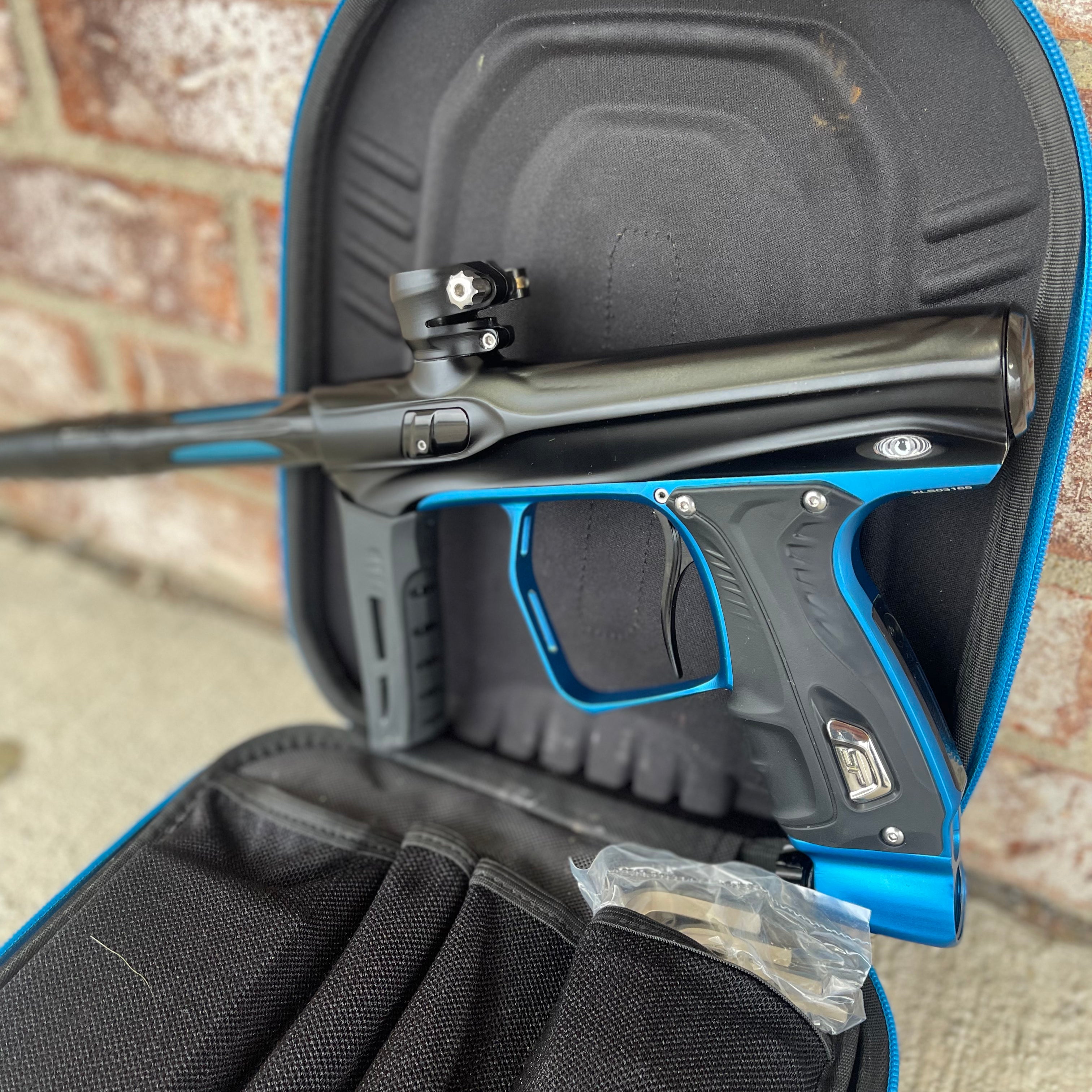 Used Shocker XLS Paintball Gun - Dust Black w/ Blue Trigger Frame