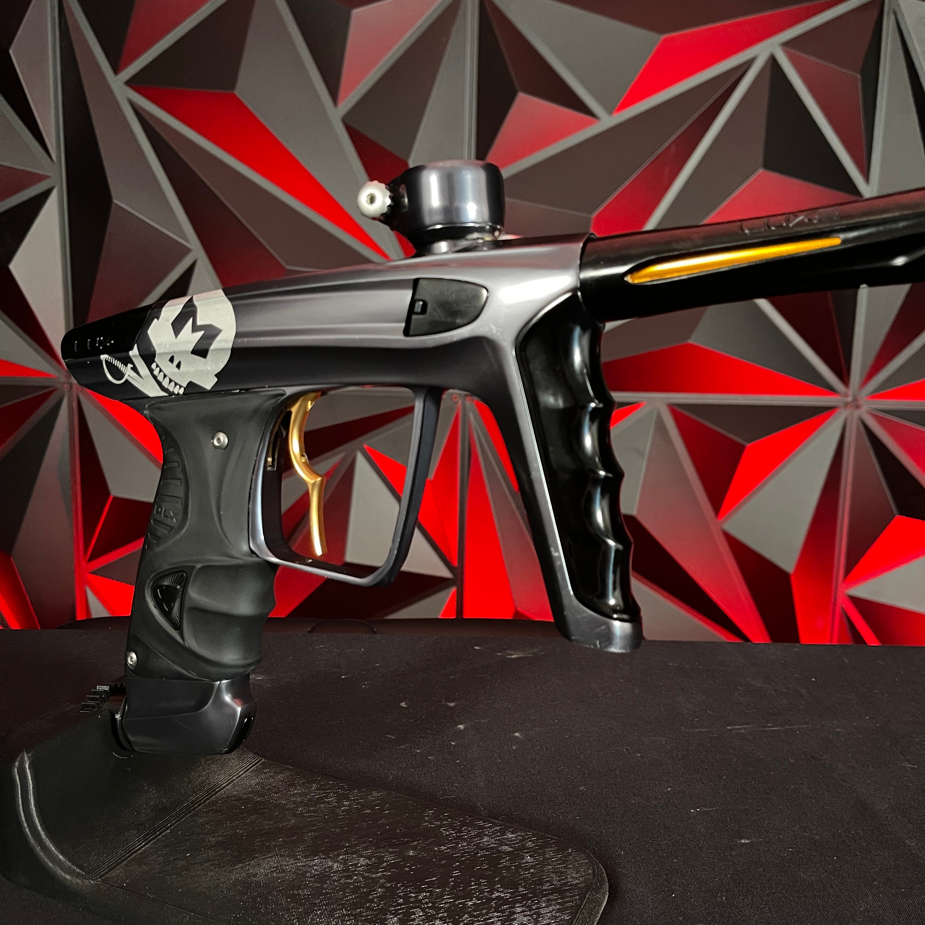 Used DLX Luxe X Paintball Gun - Polished Pewter w/ Infamous Gold Deuce Trigger