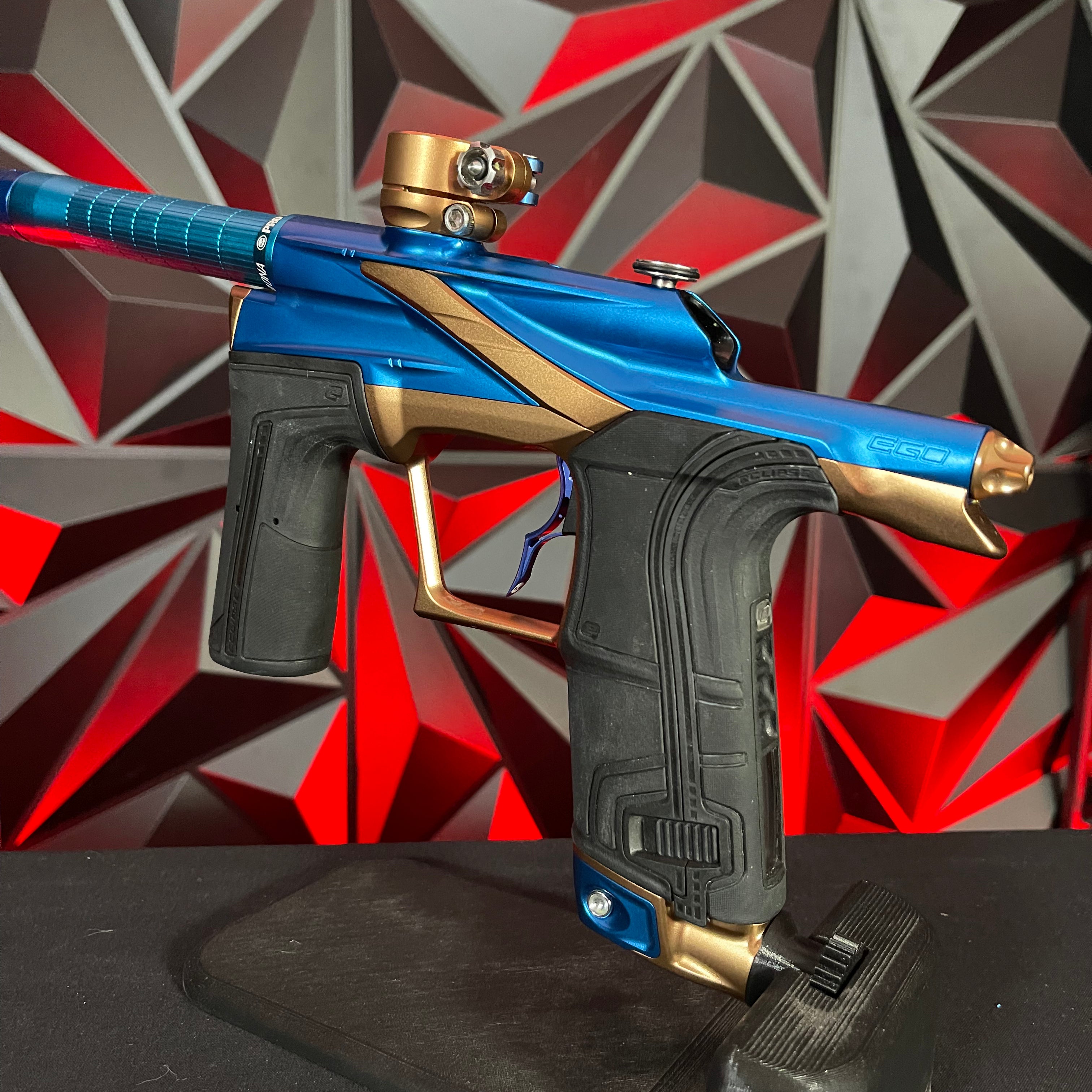Used Planet Eclipse LV2 Paintball Gun - Blue/Bronze w/ Silencio Power Grip Back *Houston Heat Signed Case*