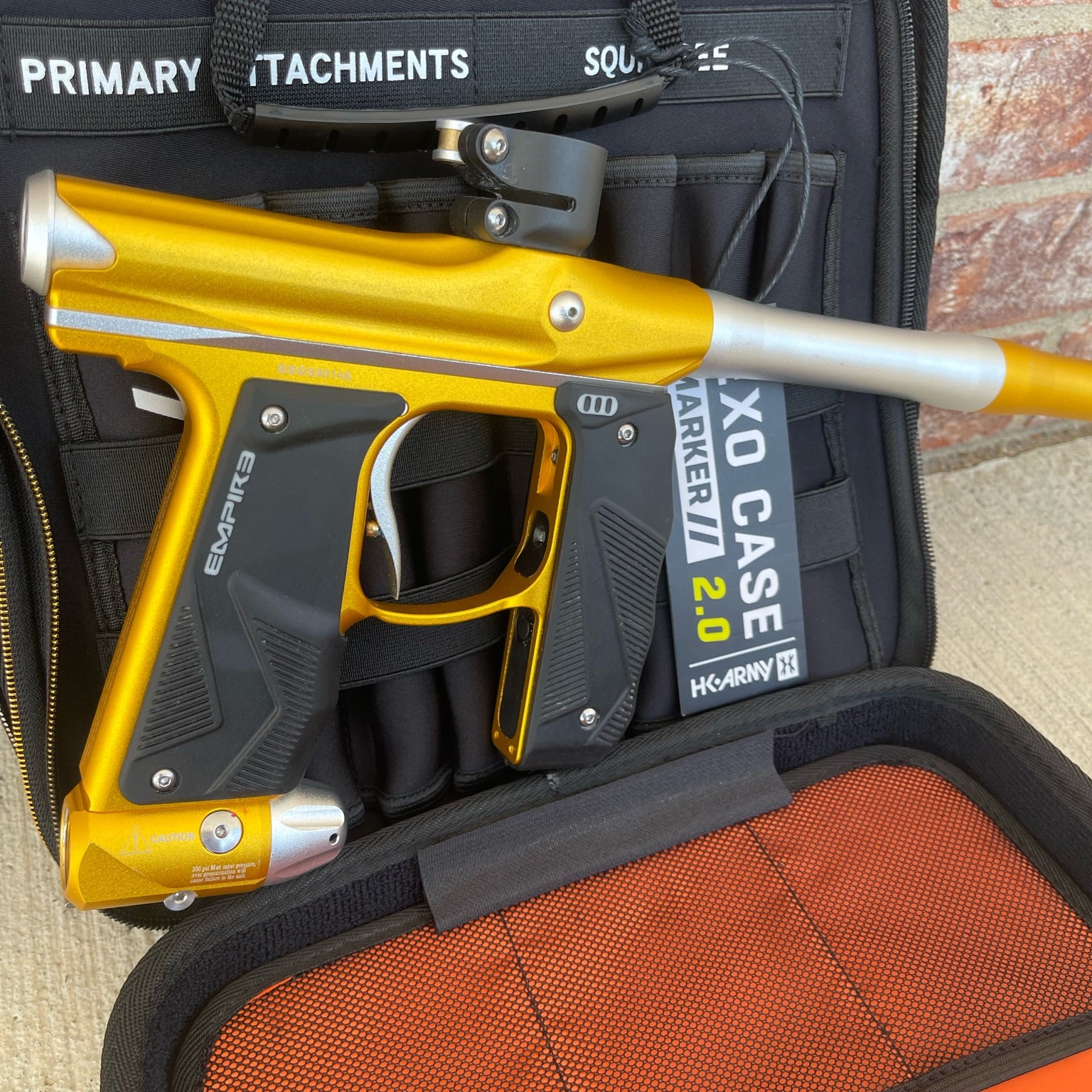 Used Empire Mini GS Paintball Gun w/ 2 Piece Barrel - Dust Gold / Silver w/ HK Army Exo 2.0 Marker Case