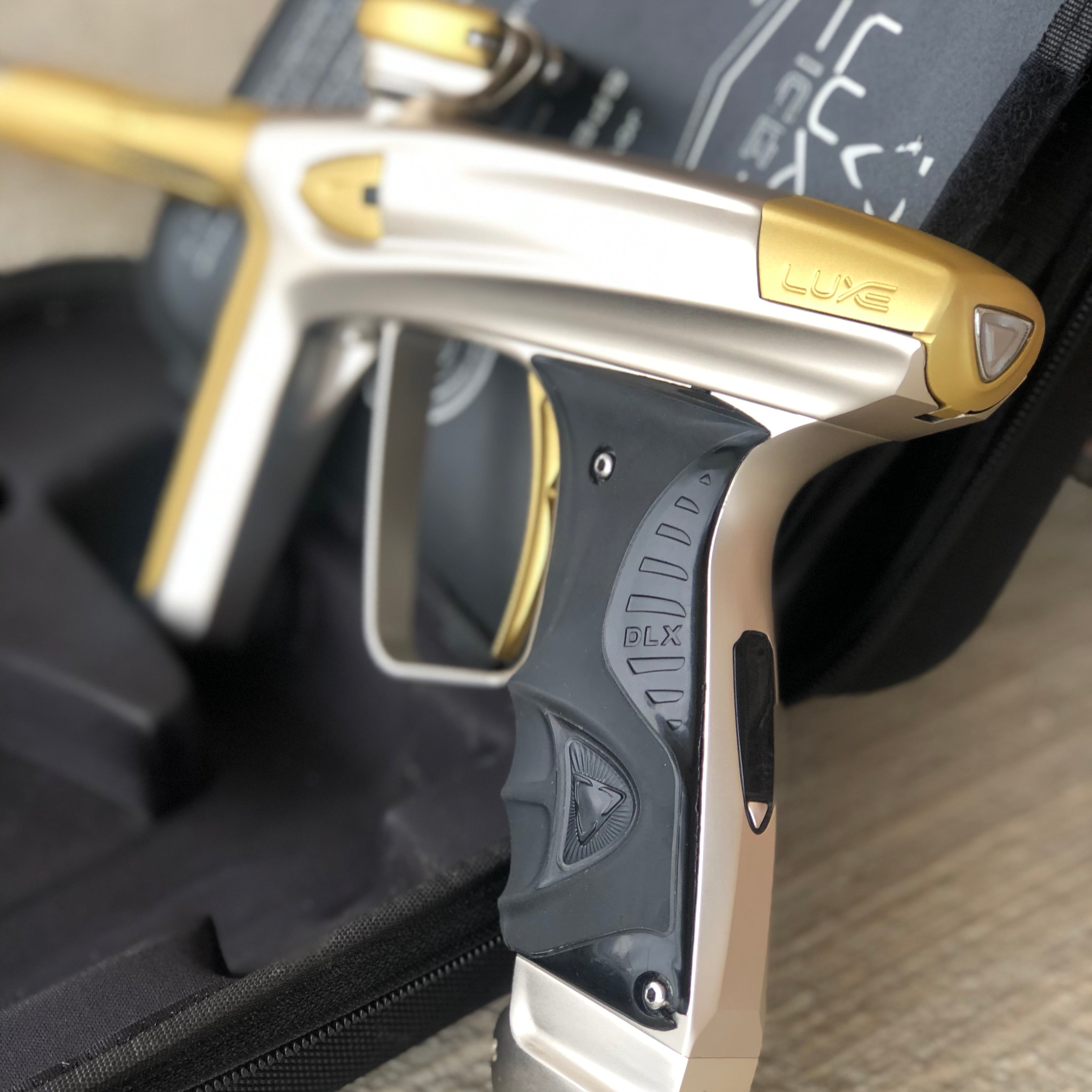 Used DLX Luxe Ice Paintball Gun - Silver / Dust Gold