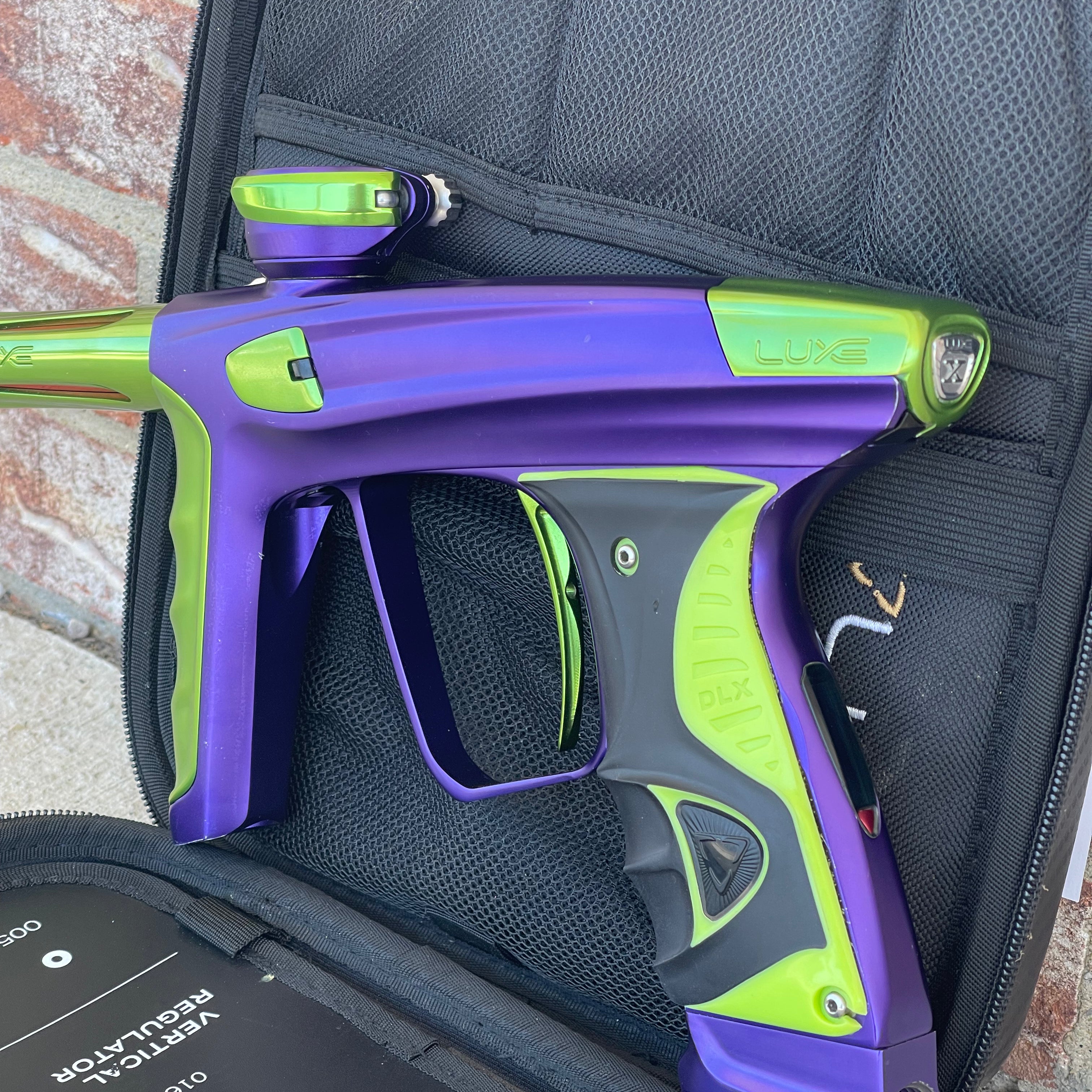 Used DLX Luxe X Paintball Gun - Dust Purple / Polished Green