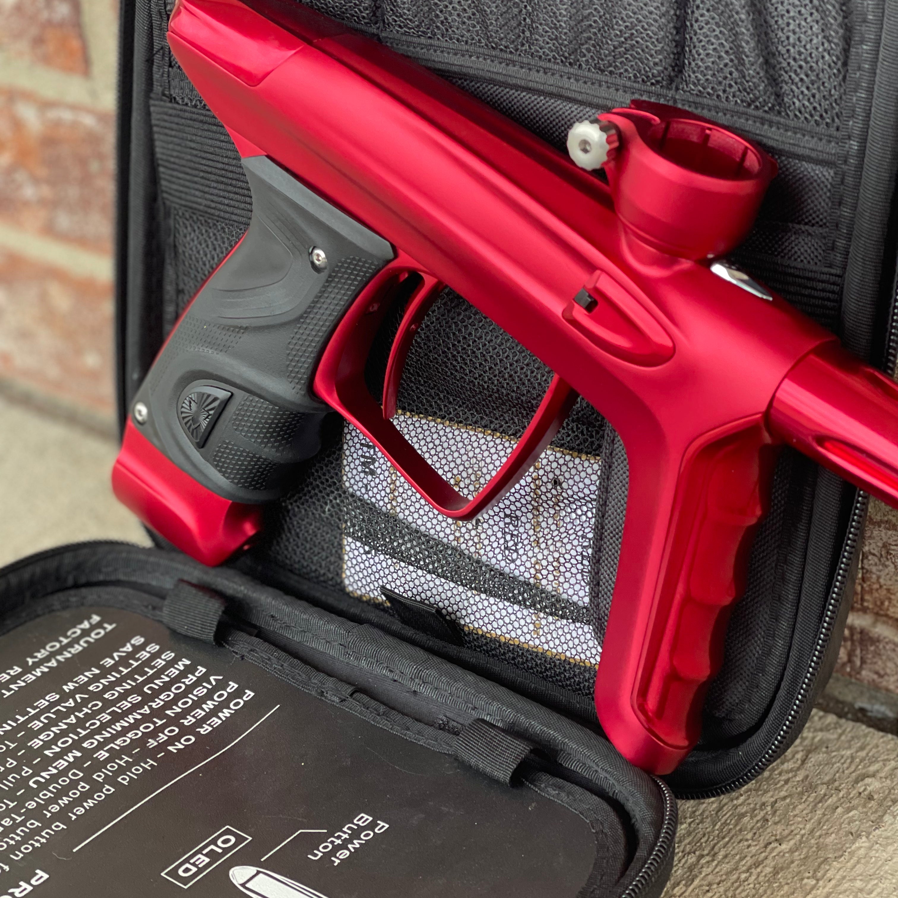 Used DLX Luxe TM40 Paintball Gun - Dust Red / Gloss Red