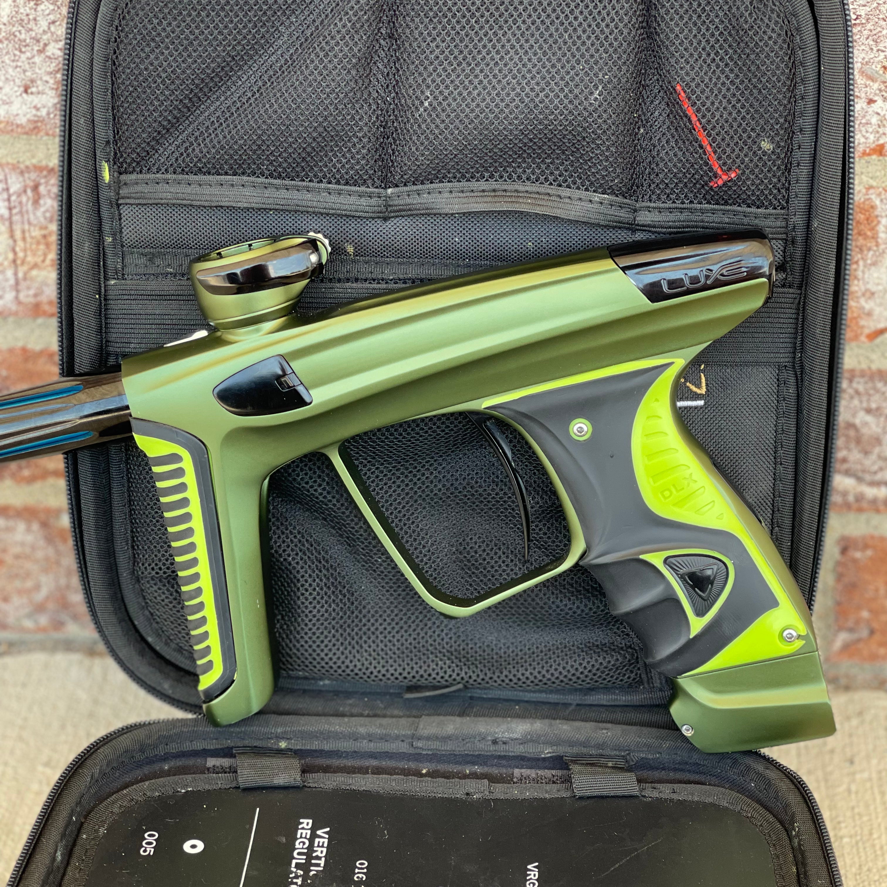 Used DLX Luxe X Paintball Gun - Dust Olive/Polished Black w/ Green Grip Kit
