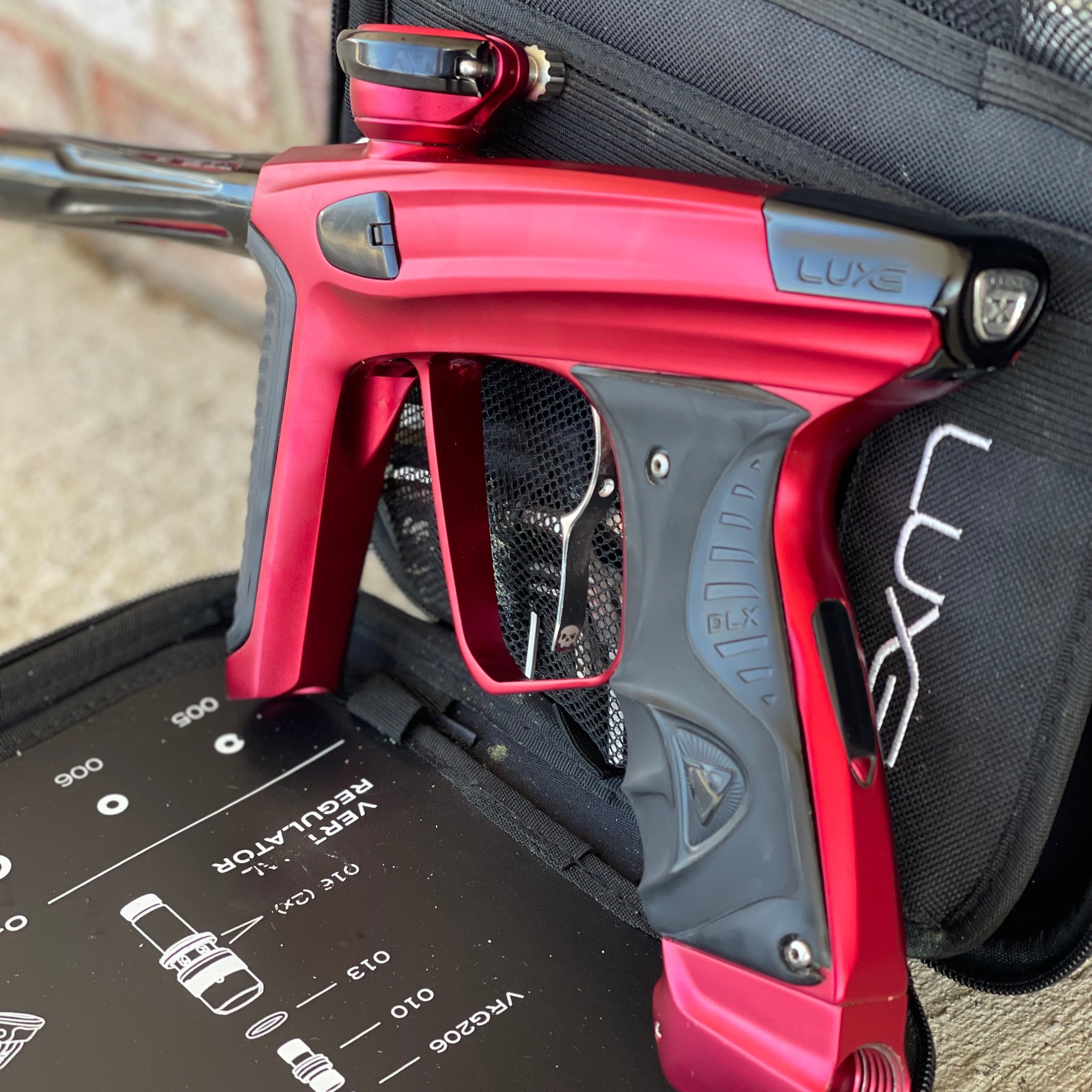 Used DLX Luxe X Paintball Gun - Dust Red w/ Infamous Deuce Trigger