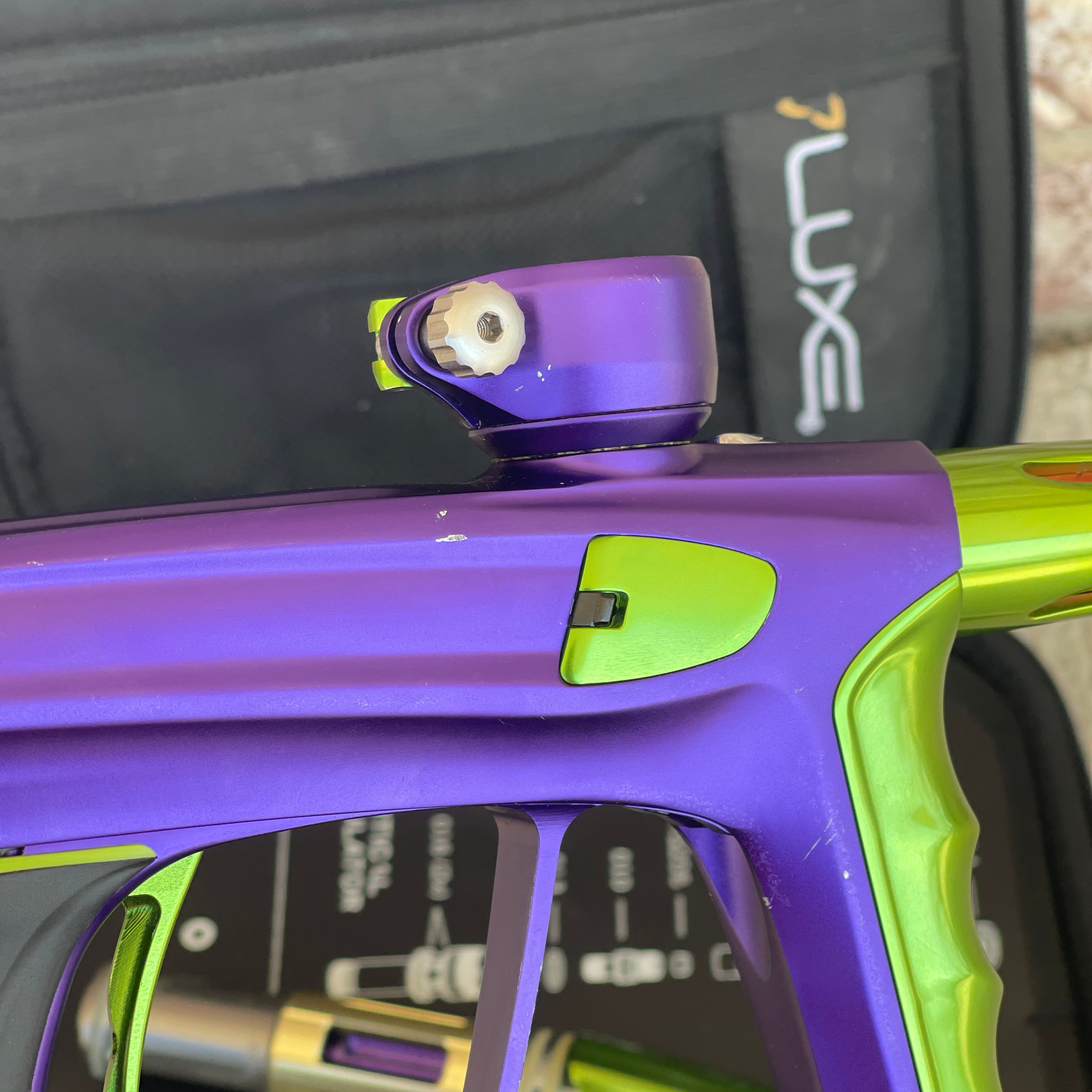 Used DLX Luxe X Paintball Gun - Dust Purple / Polished Green