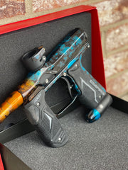 Used Empire Axe 2.0 Paintball Gun - Acid Wash Custom Anno (Orange Teal)